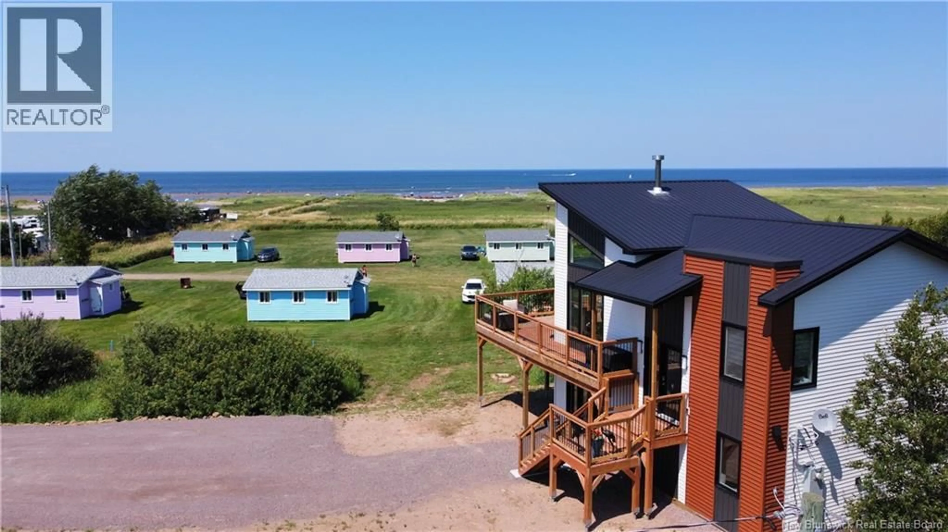 A pic from outside/outdoor area/front of a property/back of a property/a pic from drone, water/lake/river/ocean view for 53-57 CHEMIN PLAGE GAGNON BEACH, Grand-Barachois New Brunswick E4P7Z5