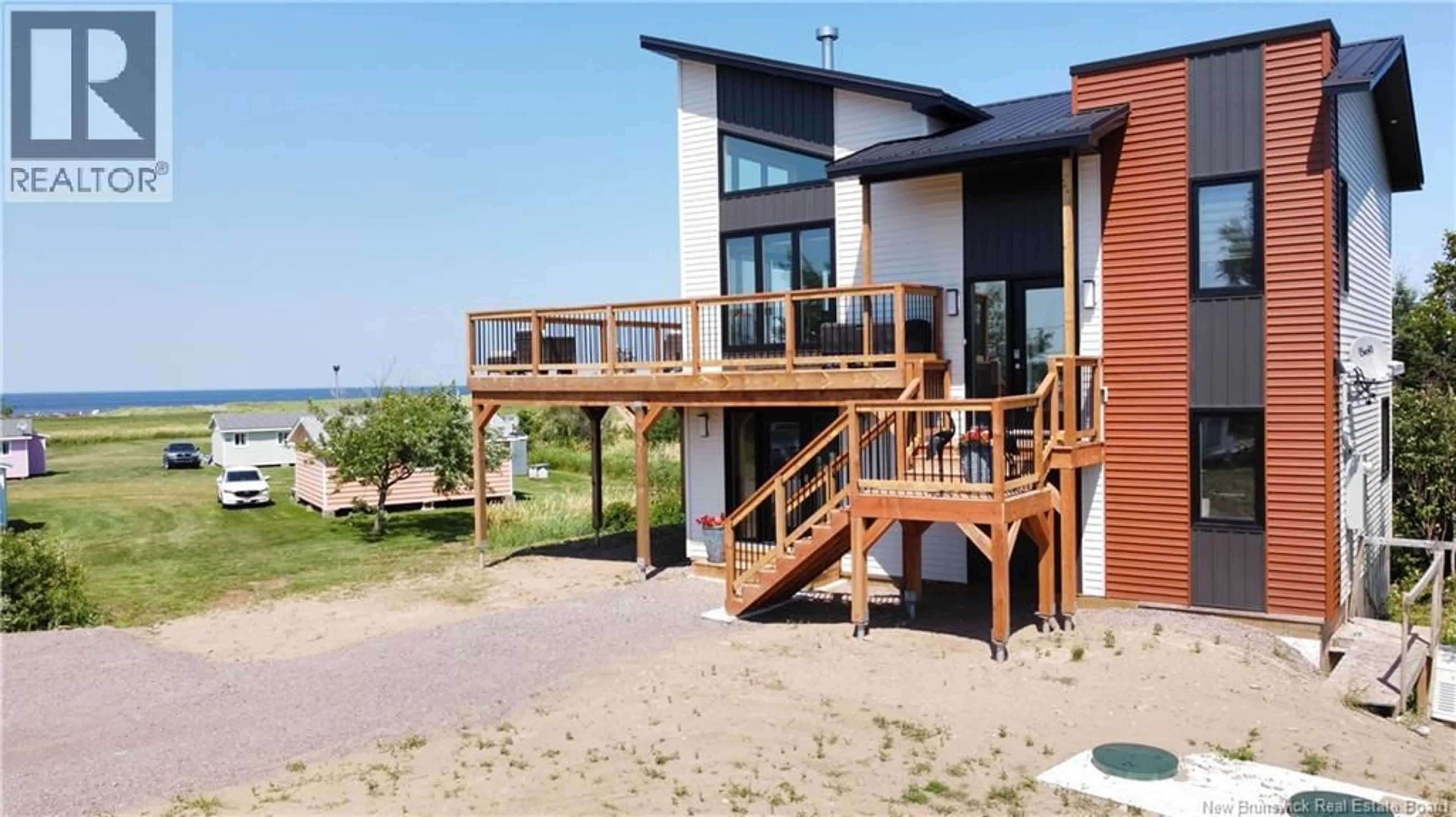 Patio, water/lake/river/ocean view for 53-57 CHEMIN PLAGE GAGNON BEACH, Grand-Barachois New Brunswick E4P7Z5