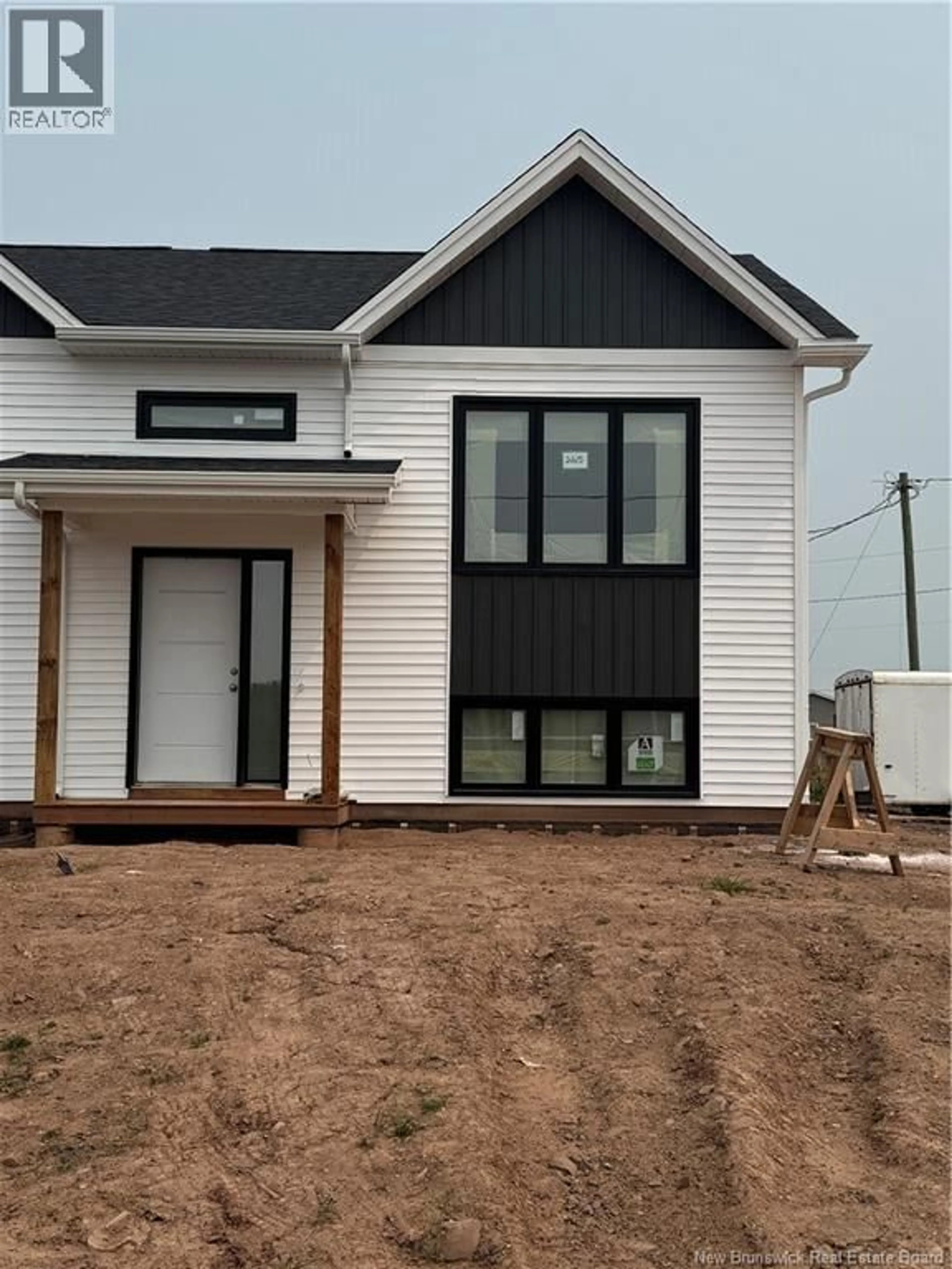 Home with vinyl exterior material, street for 265 MACCOUN STREET, Moncton New Brunswick E1K0A1