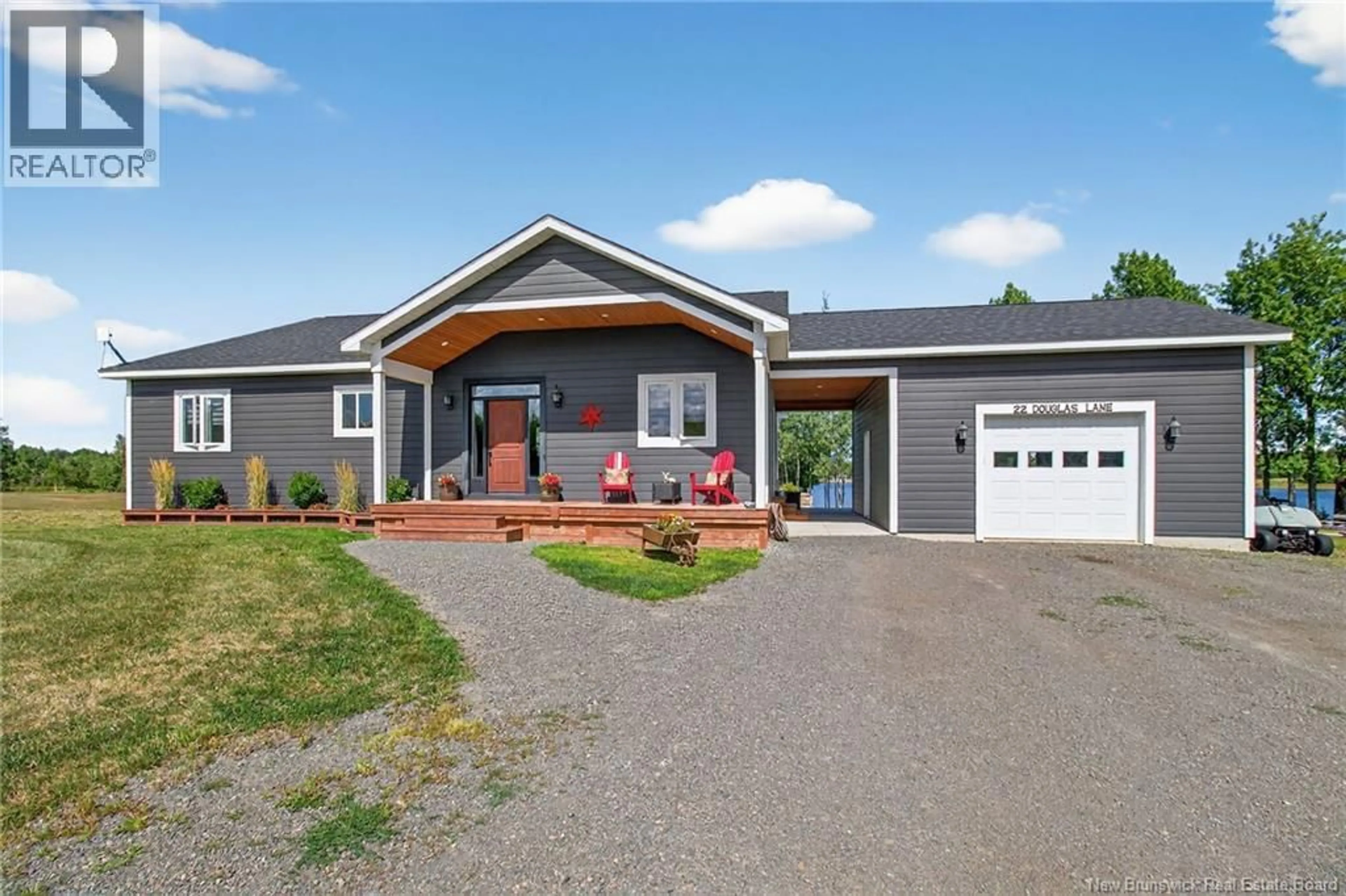 Home with vinyl exterior material, street for 22 DOUGLAS LANE, Bass River New Brunswick E4T0E4