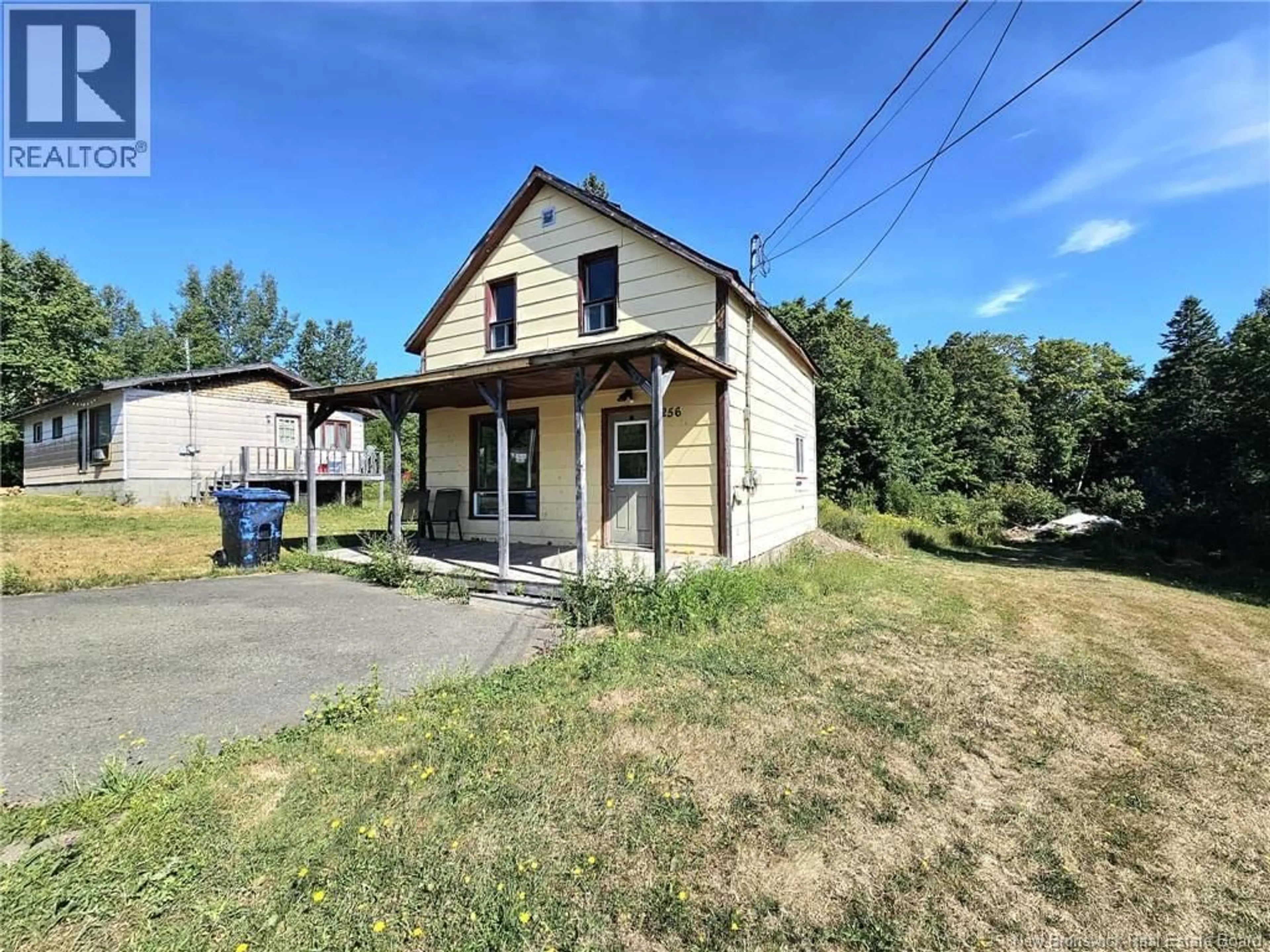 A pic from outside/outdoor area/front of a property/back of a property/a pic from drone, street for 256 MAIN STREET, Lorne New Brunswick E8G1L8