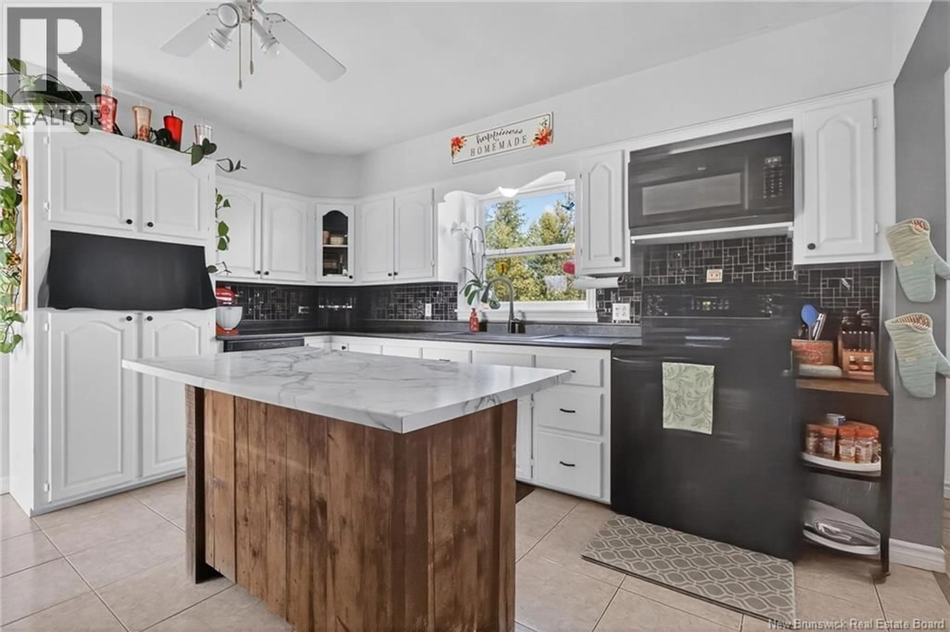 Open concept kitchen, ceramic/tile floor for 3135 ROUTE 132, Scoudouc New Brunswick E4P3R8