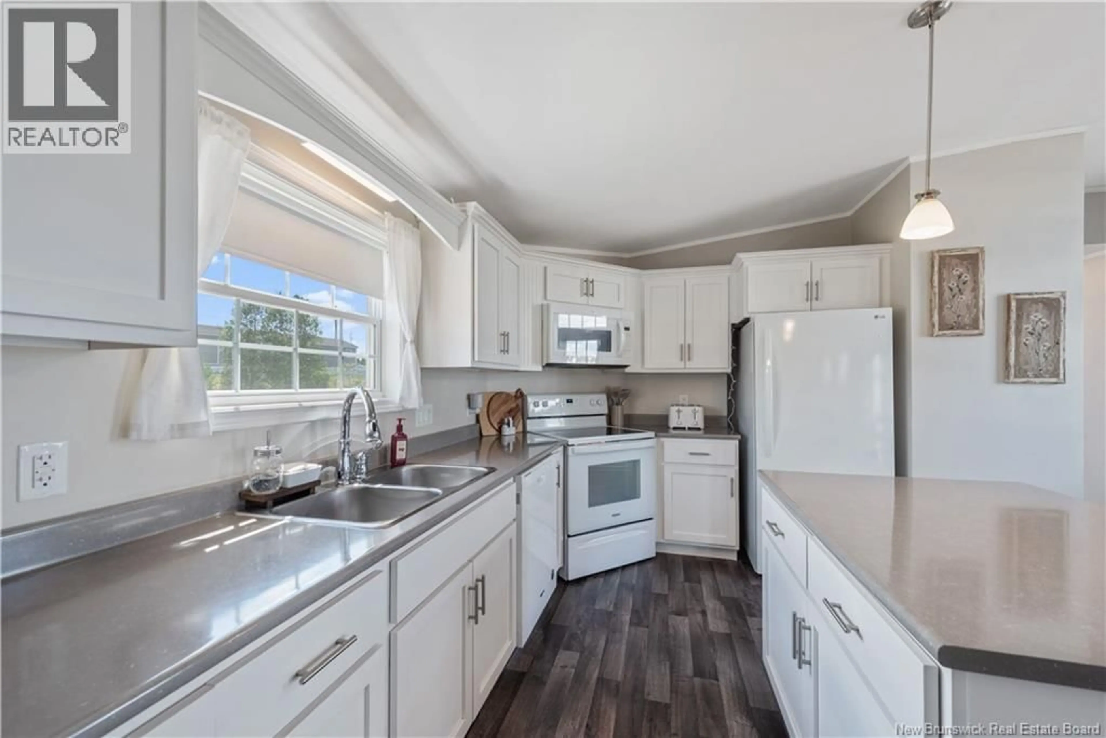 Open concept kitchen, ceramic/tile floor for 28 CRANBROOK LANE, Riverview New Brunswick E1B0N6