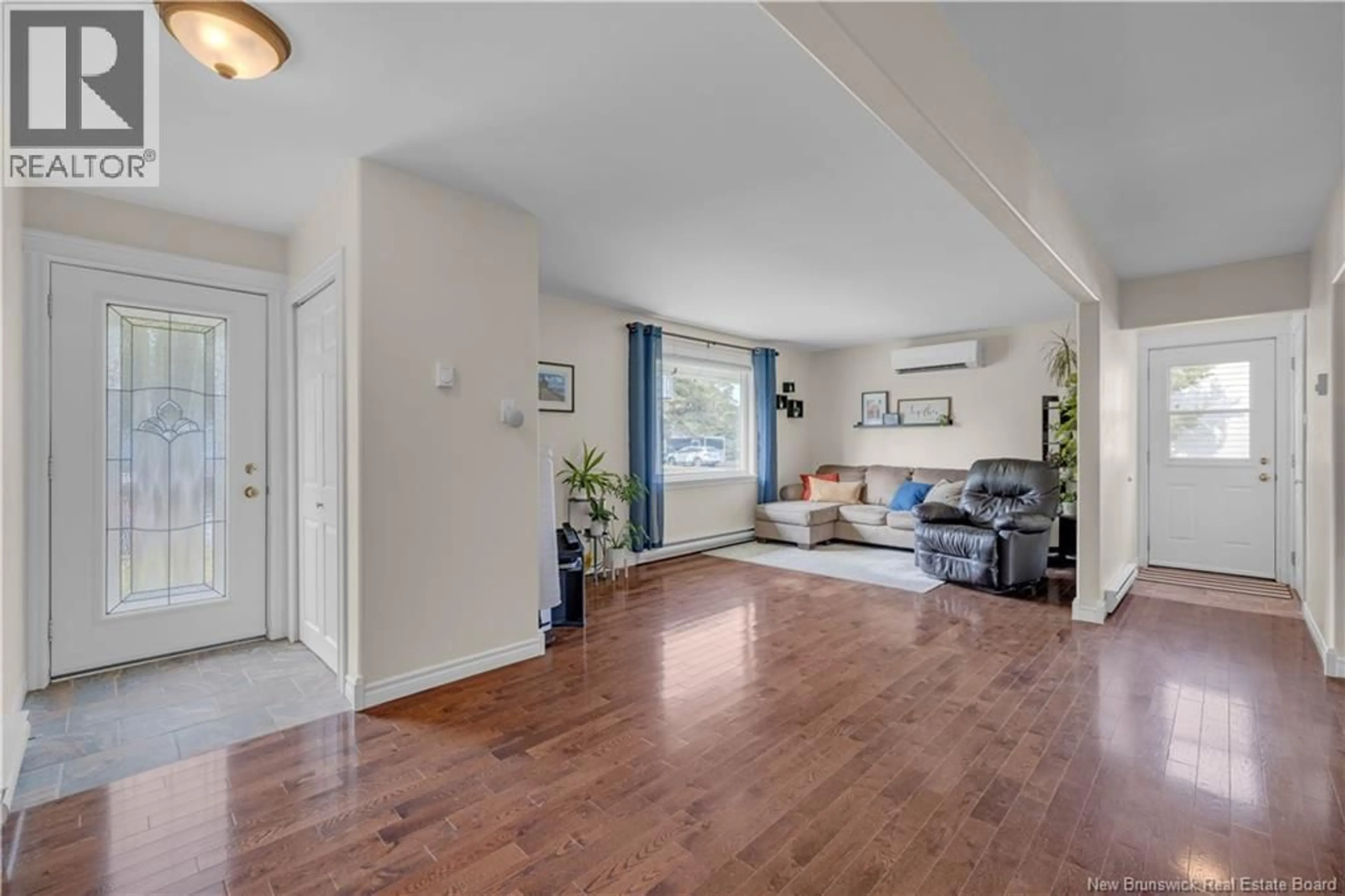 Living room with furniture, wood/laminate floor for 10 SWANTON STREET, Saint John New Brunswick E2J3J8