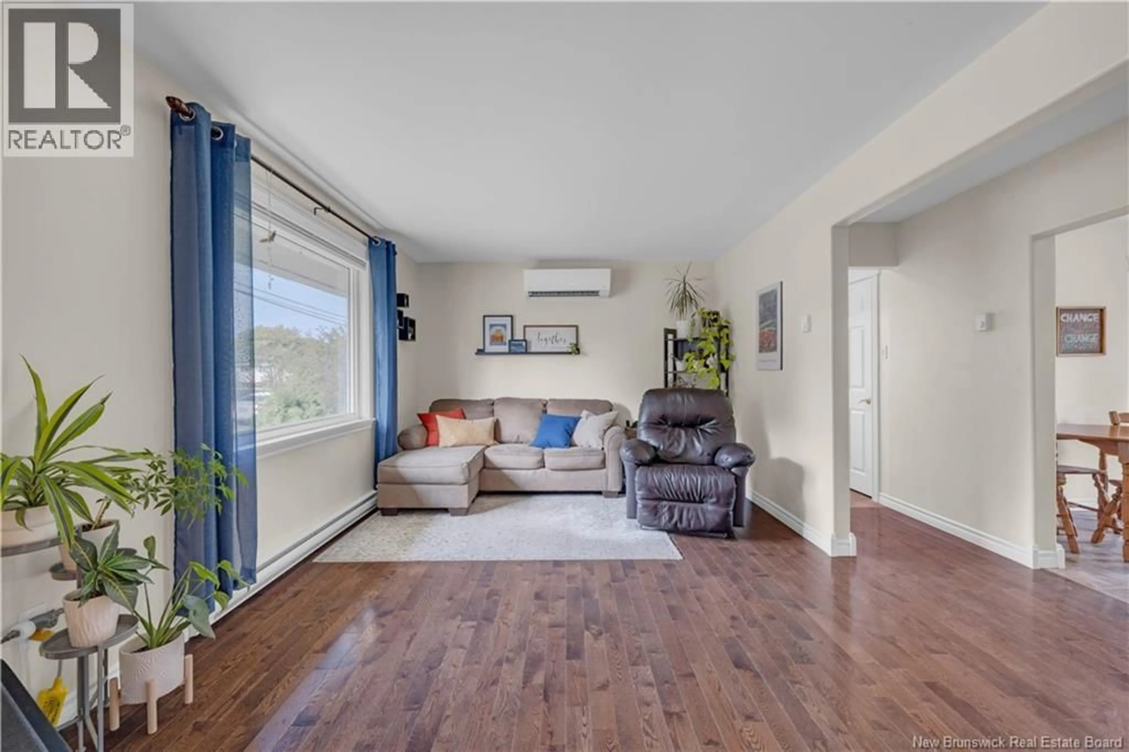 Living room with furniture, wood/laminate floor for 10 SWANTON STREET, Saint John New Brunswick E2J3J8