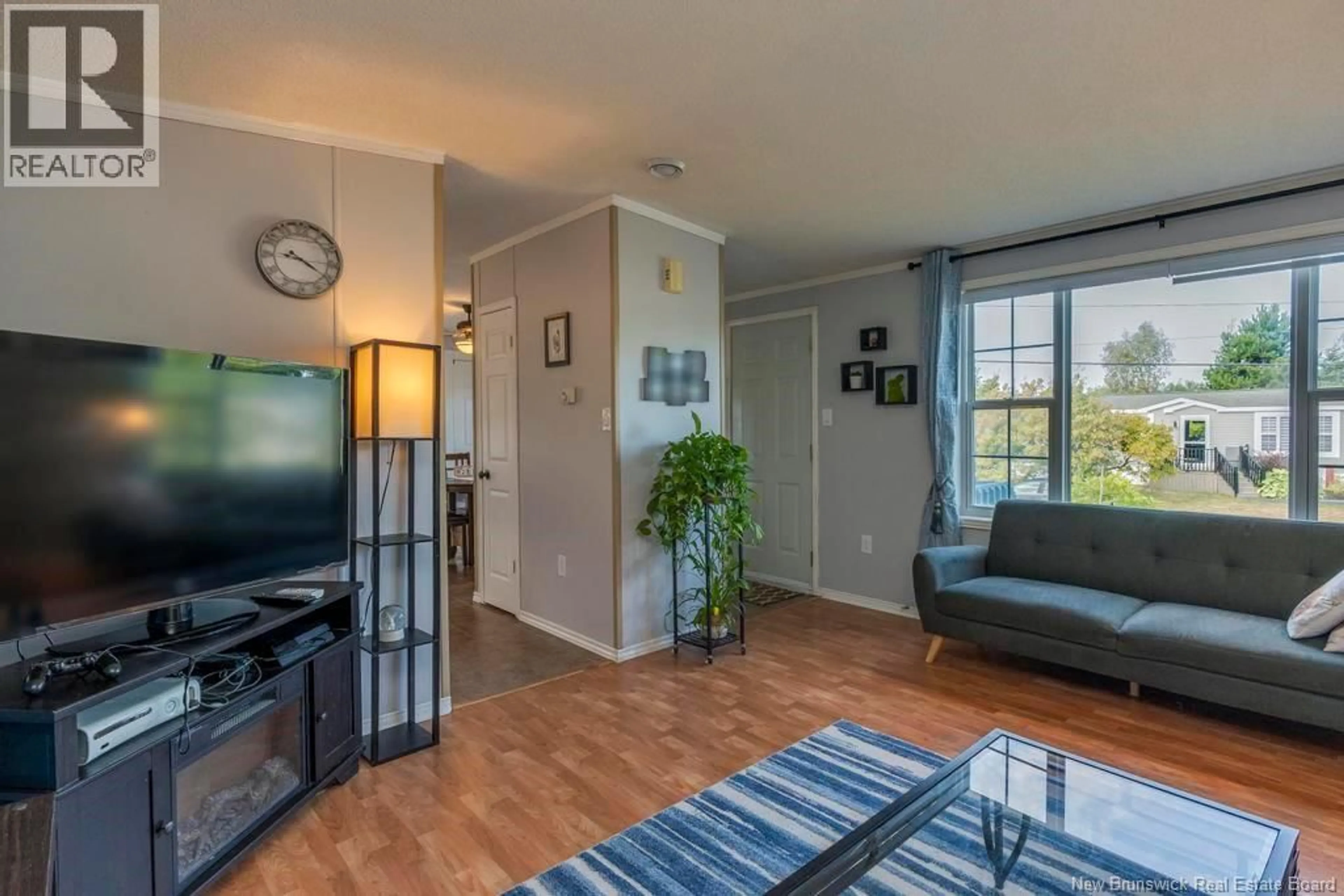 Living room with furniture, unknown for 16 RESTIGOUCHE DRIVE, Dieppe New Brunswick E1A7N1