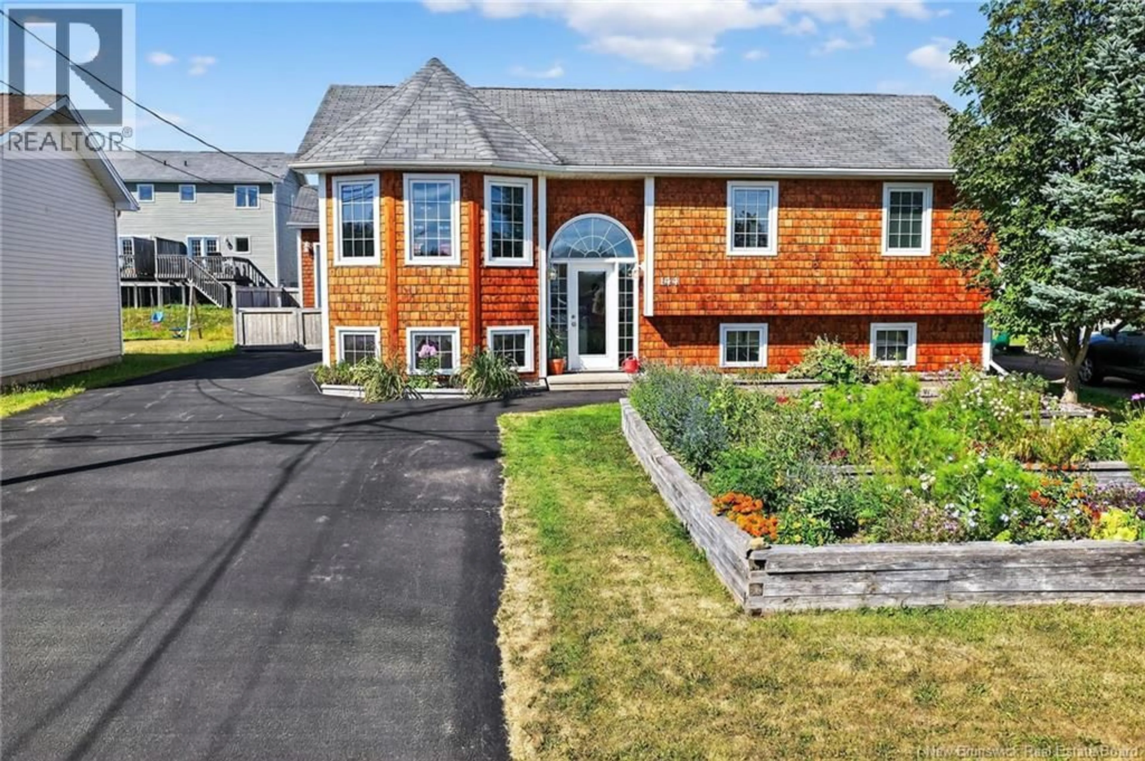 Home with vinyl exterior material, street for 144 OAK RIDGE DRIVE, Moncton New Brunswick E1G0M2