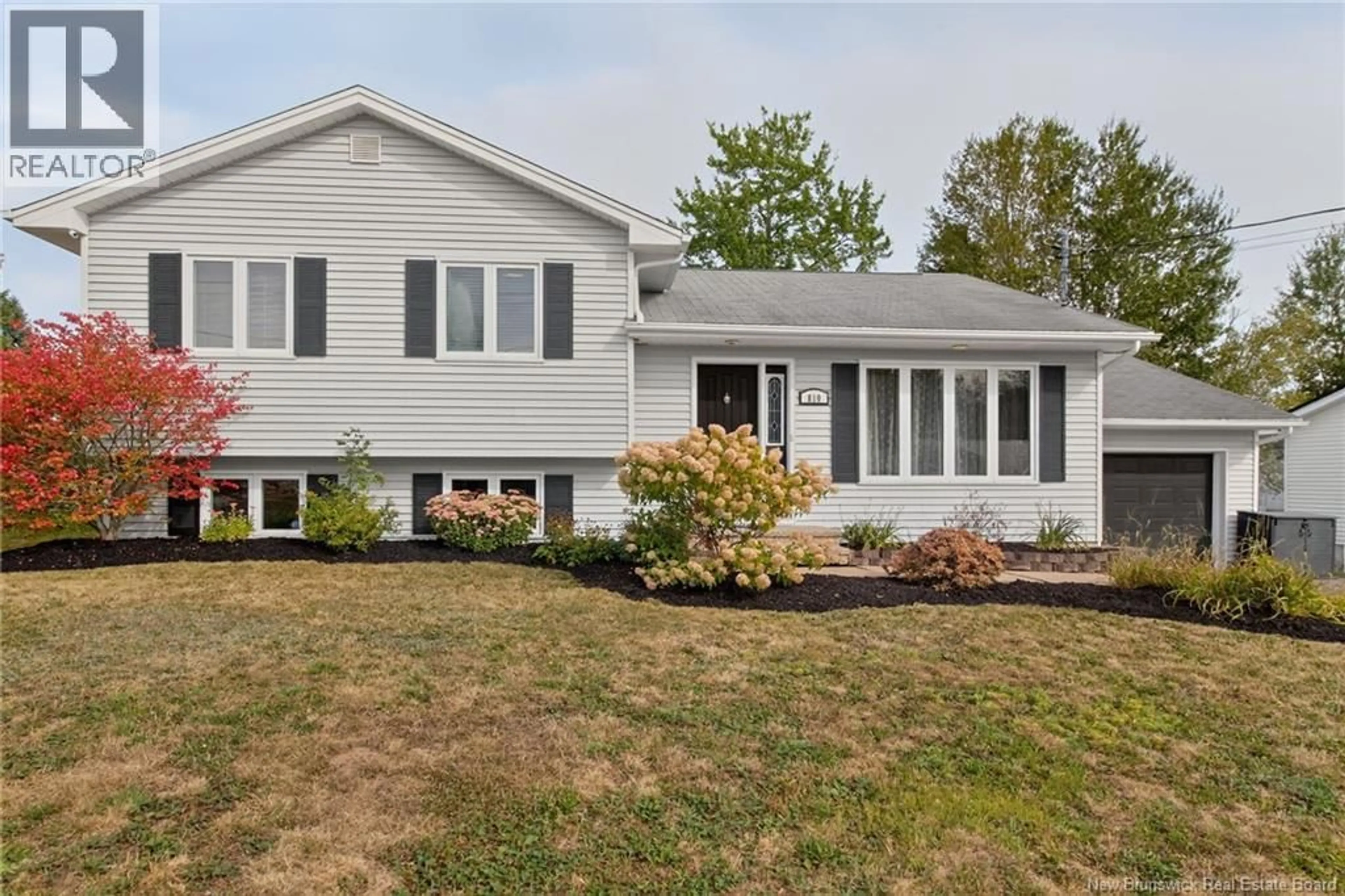 Home with vinyl exterior material, street for 810 CENTRALE STREET, Dieppe New Brunswick E1A6V5