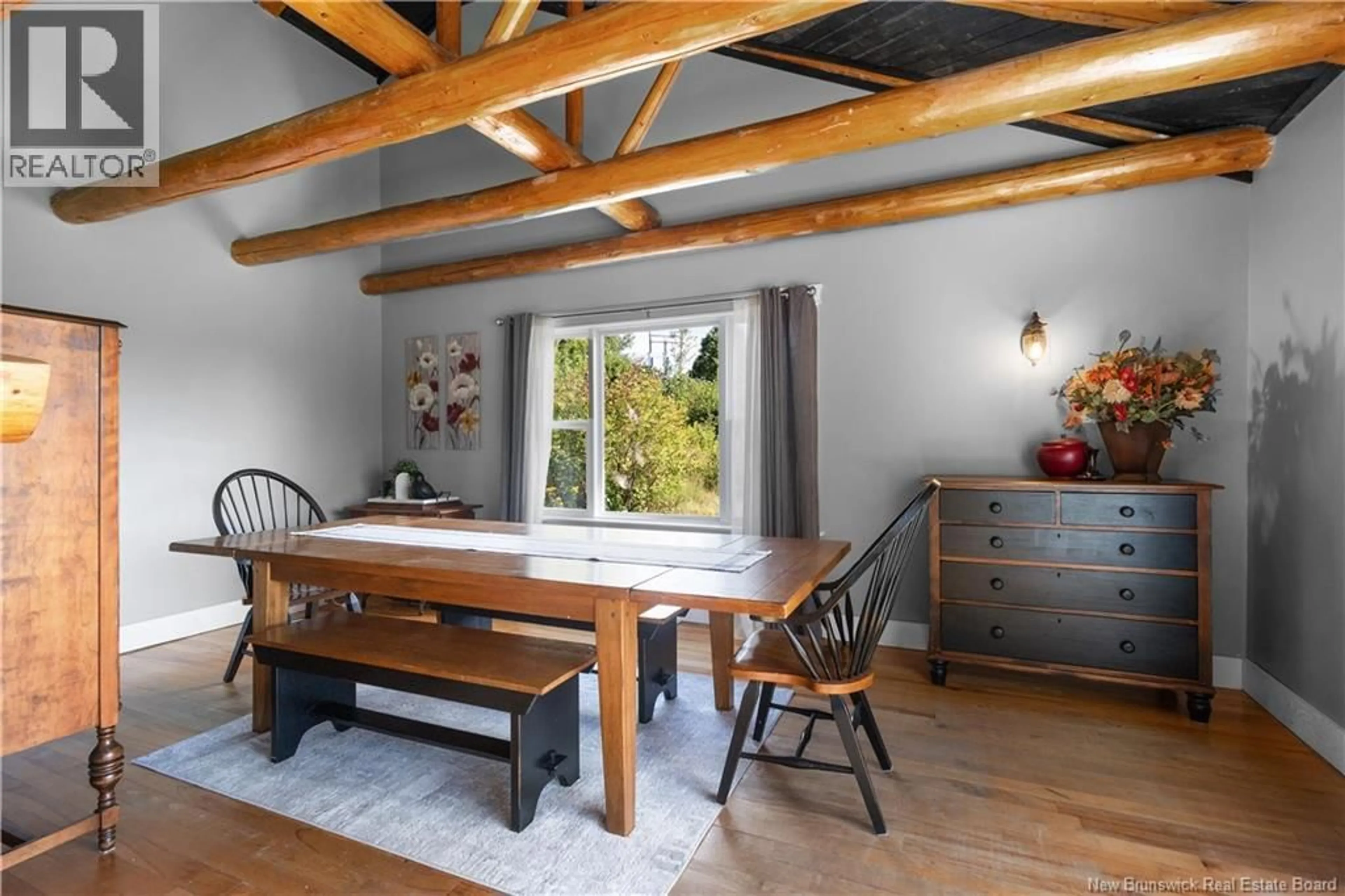 Dining room, wood/laminate floor for 21 TOZER LANE, Sunny Corner New Brunswick E9E1S7