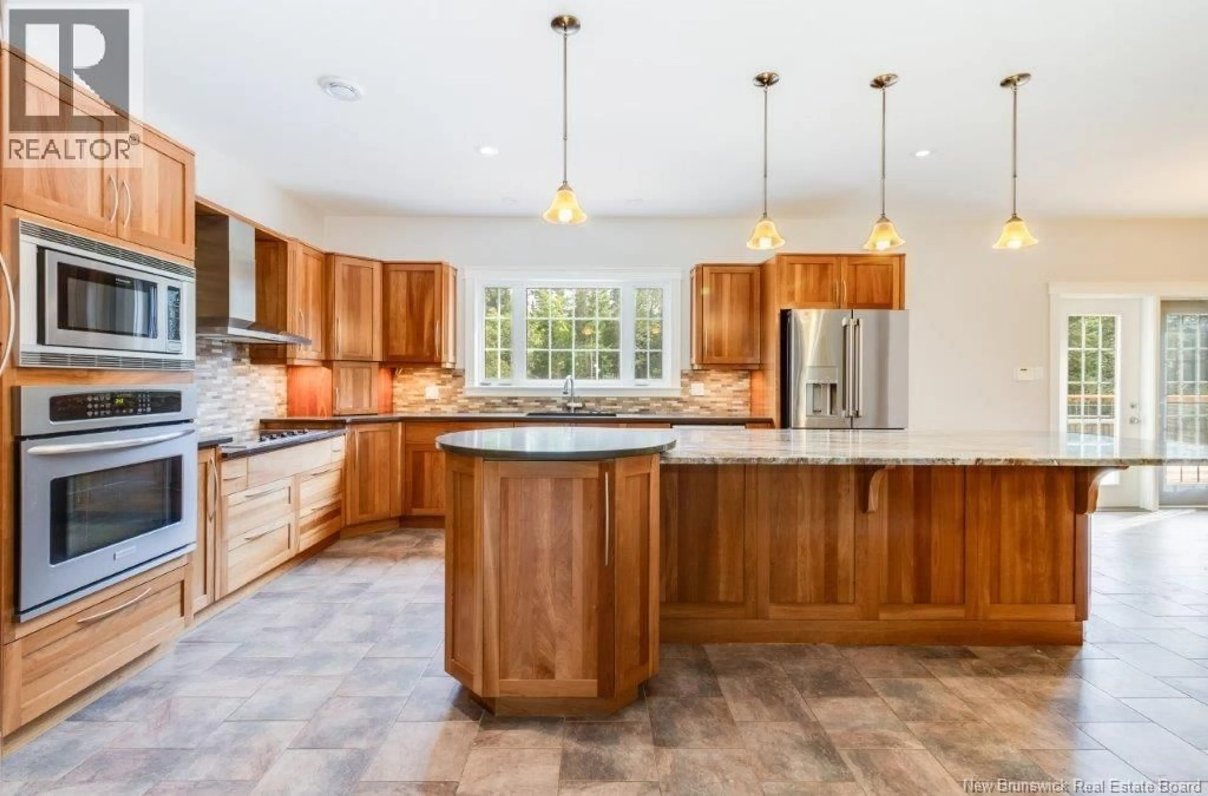 Open concept kitchen, ceramic/tile floor for 122 SUMMERHILL ROW, Fredericton New Brunswick E3G0E9
