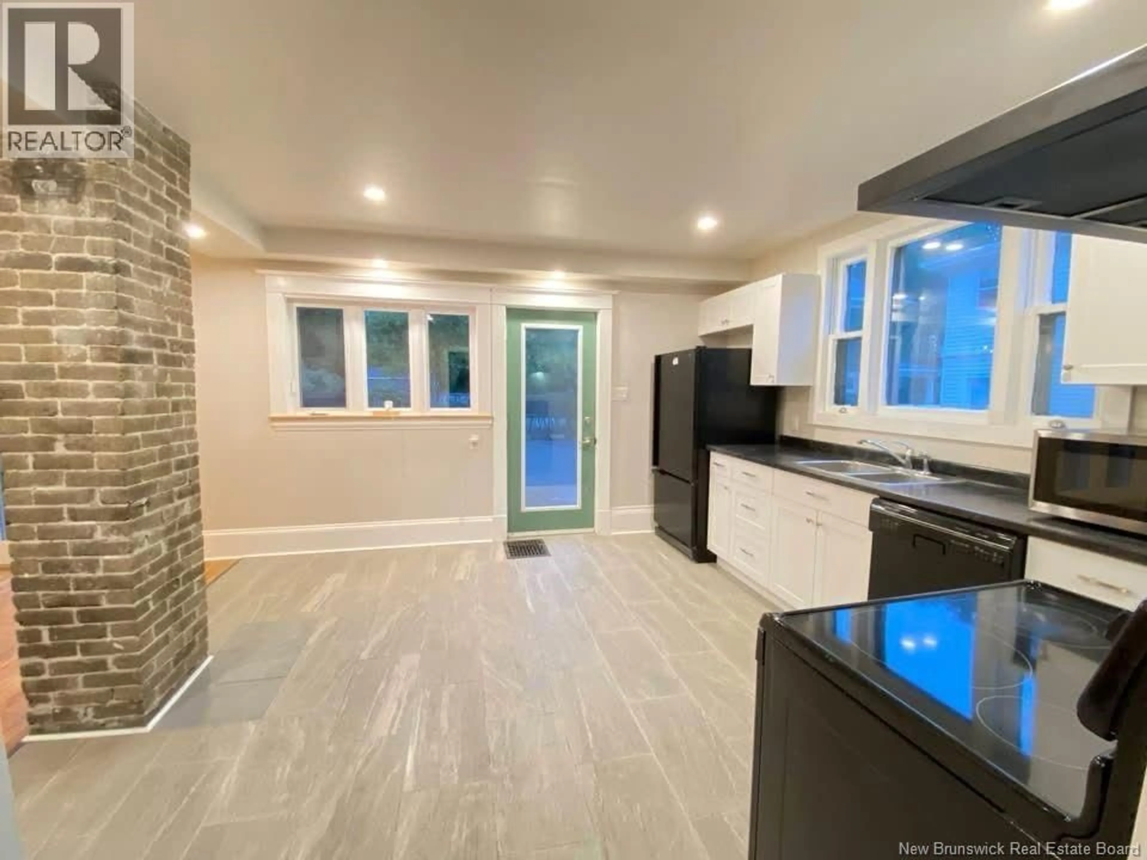 Open concept kitchen, ceramic/tile floor for 73 JOHN STREET, Moncton New Brunswick E1C2H2