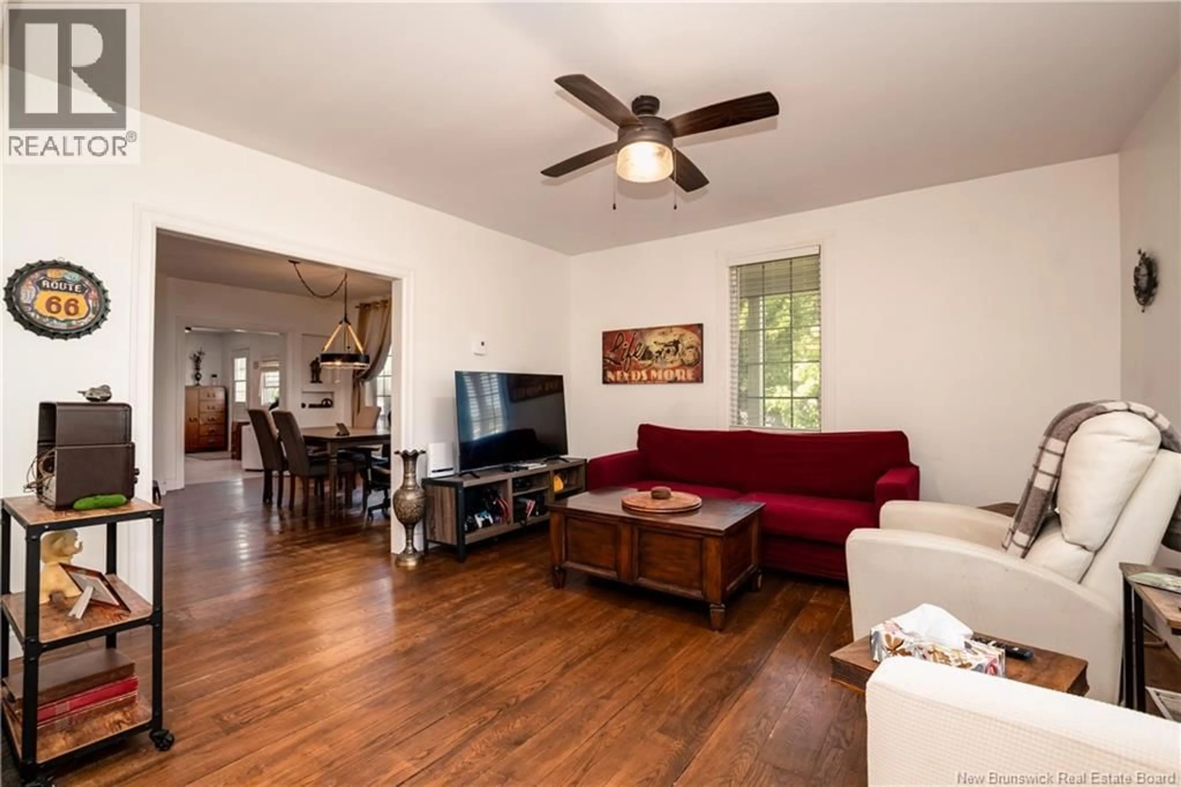 Living room with furniture, wood/laminate floor for 3216 MAIN, Salisbury New Brunswick E4J2M1