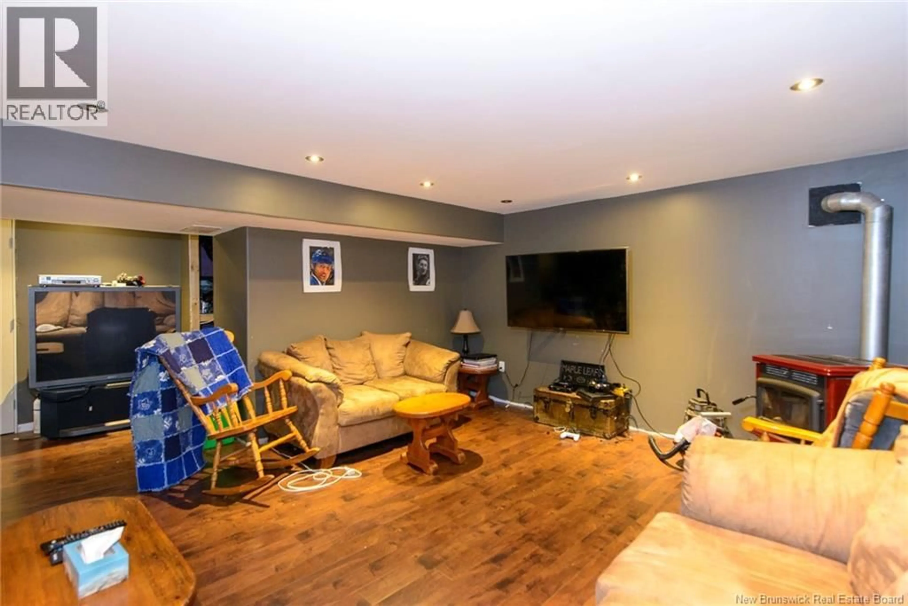 Living room with furniture, wood/laminate floor for 2 BOYD DRIVE, Grand Bay-Westfield New Brunswick E5K0A1