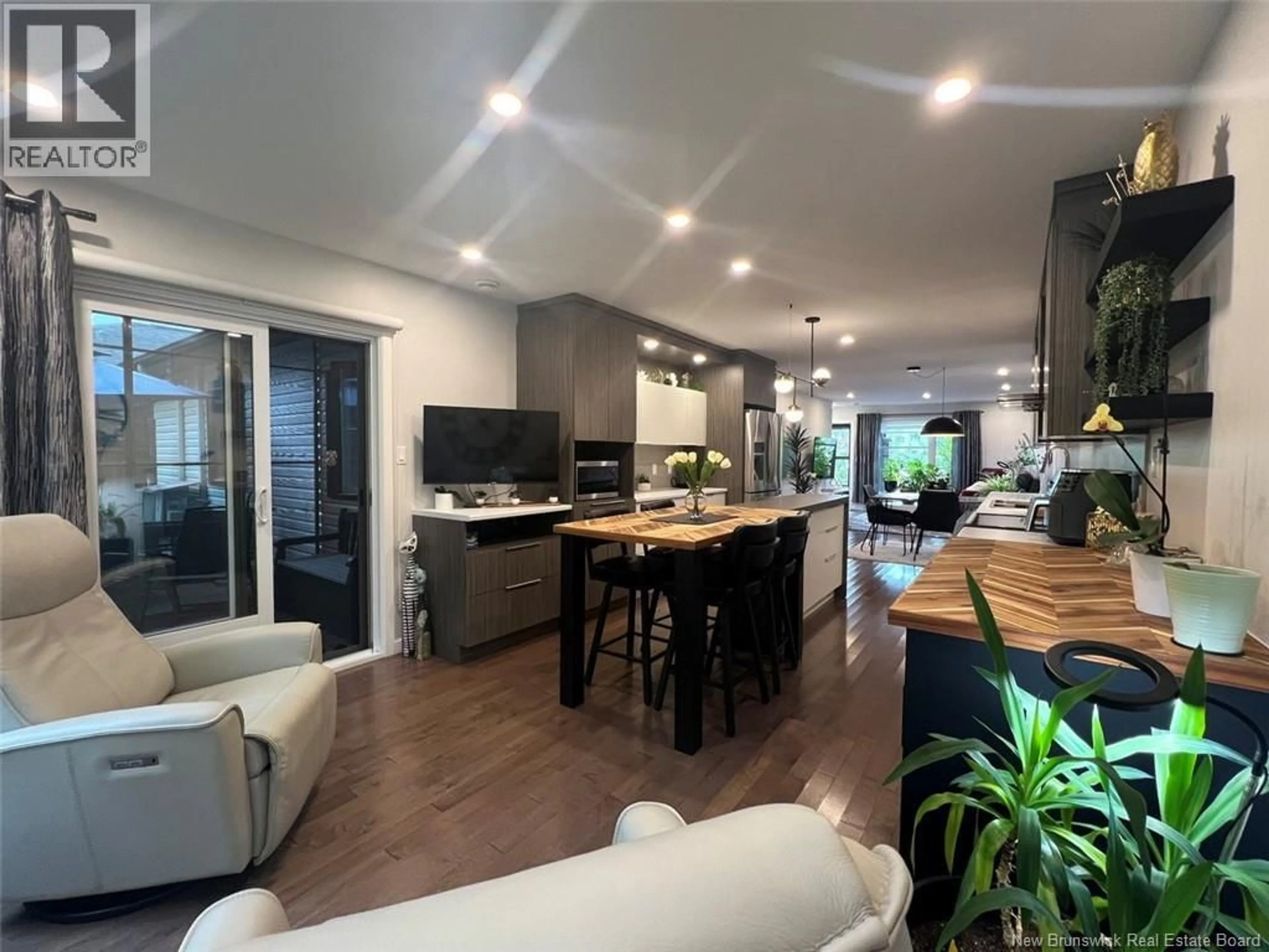 Open concept kitchen, wood/laminate floor for 57 RÉAL STREET, Edmundston New Brunswick E3V0E2