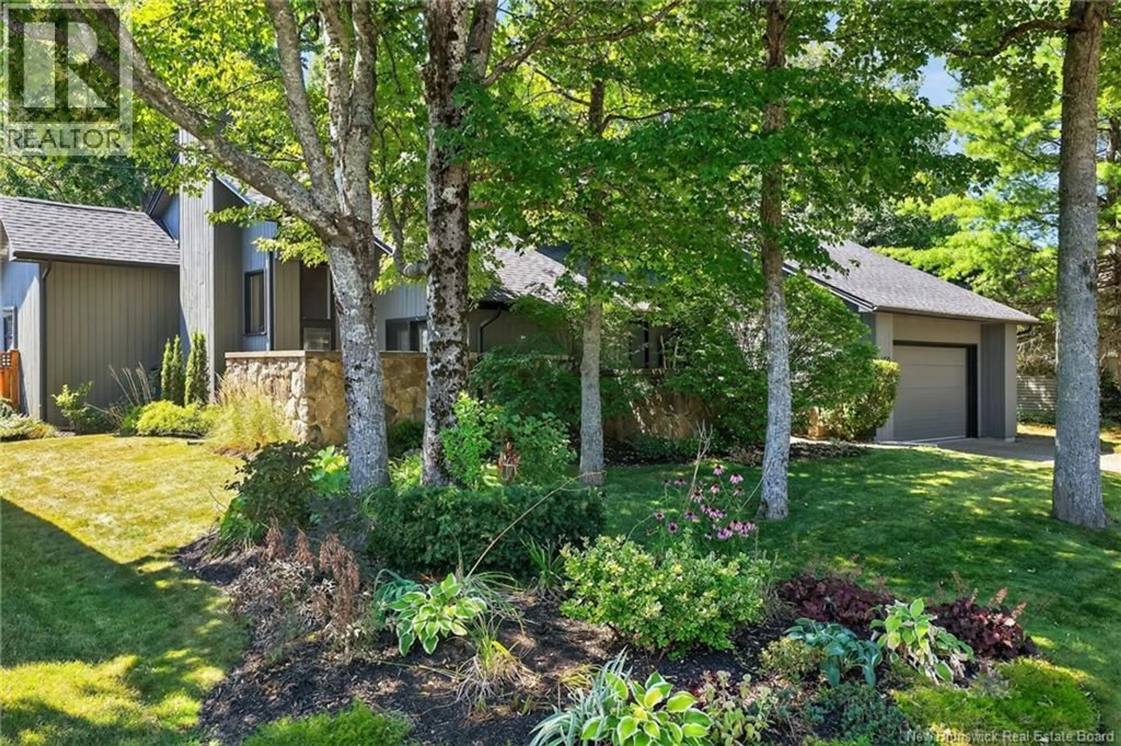 A pic from outside/outdoor area/front of a property/back of a property/a pic from drone, unknown for 30 BIRCHWOOD CRESCENT, Moncton New Brunswick E1E3Y7