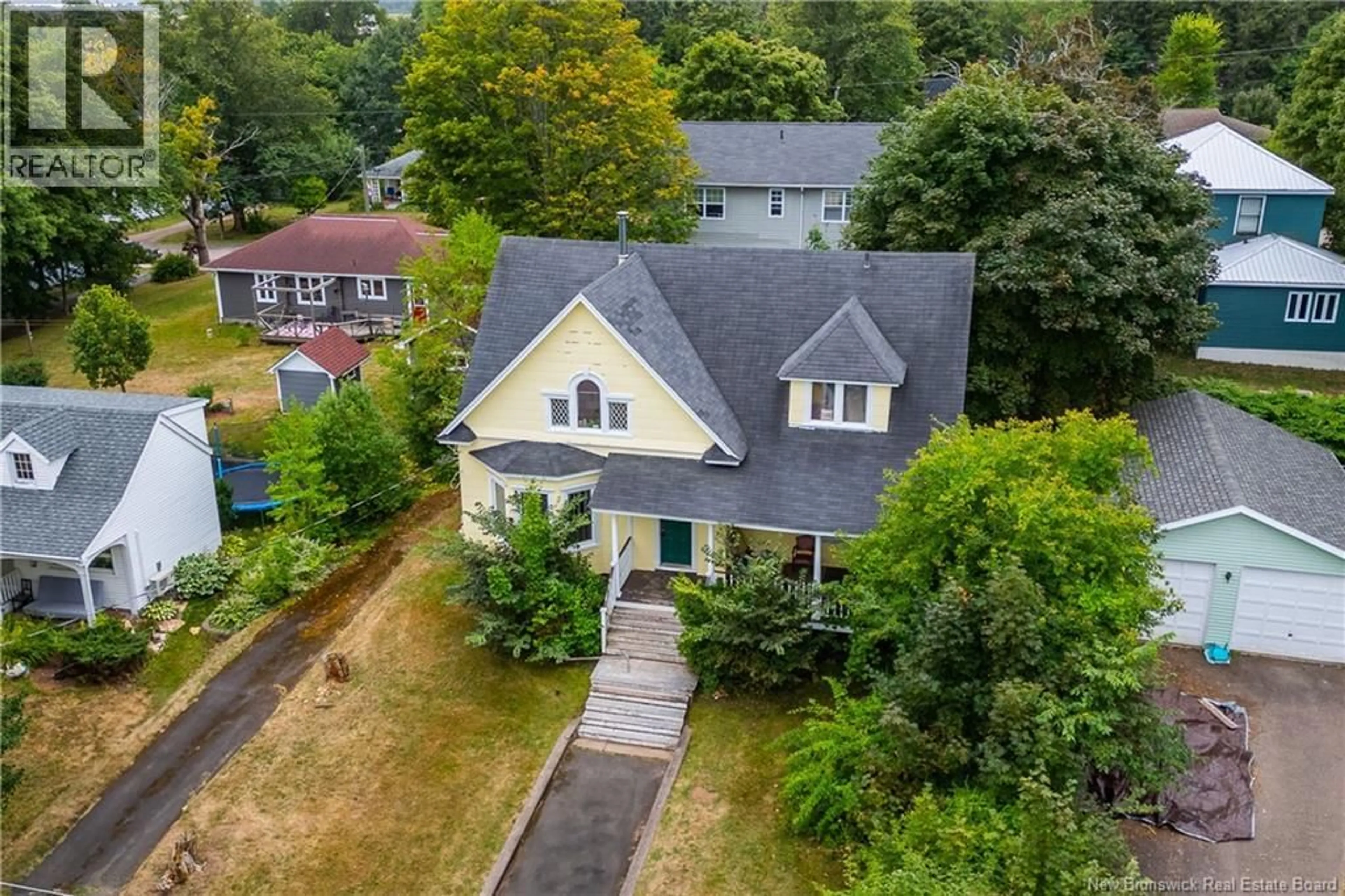 A pic from outside/outdoor area/front of a property/back of a property/a pic from drone, street for 14 ESTABROOKS STREET, Sackville New Brunswick E4L3W7