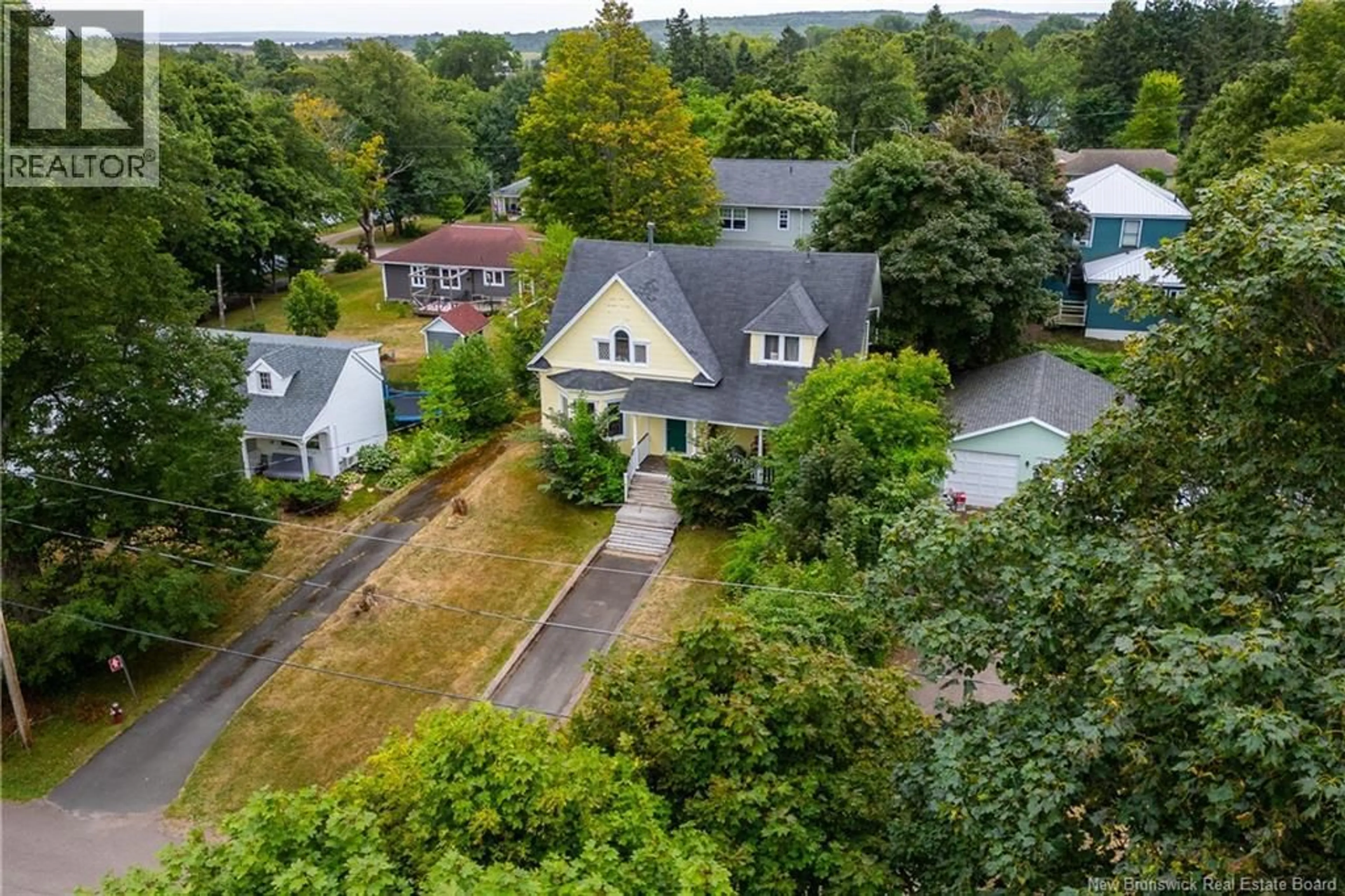 A pic from outside/outdoor area/front of a property/back of a property/a pic from drone, street for 14 ESTABROOKS STREET, Sackville New Brunswick E4L3W7