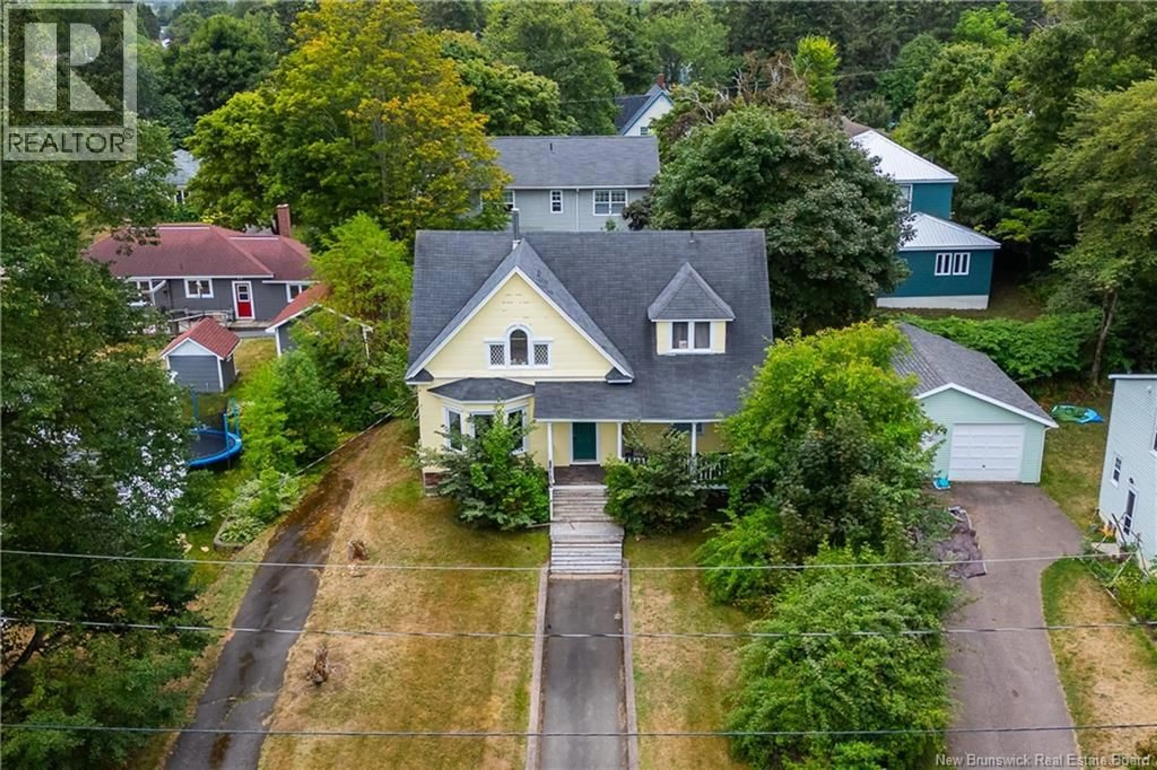 A pic from outside/outdoor area/front of a property/back of a property/a pic from drone, street for 14 ESTABROOKS STREET, Sackville New Brunswick E4L3W7
