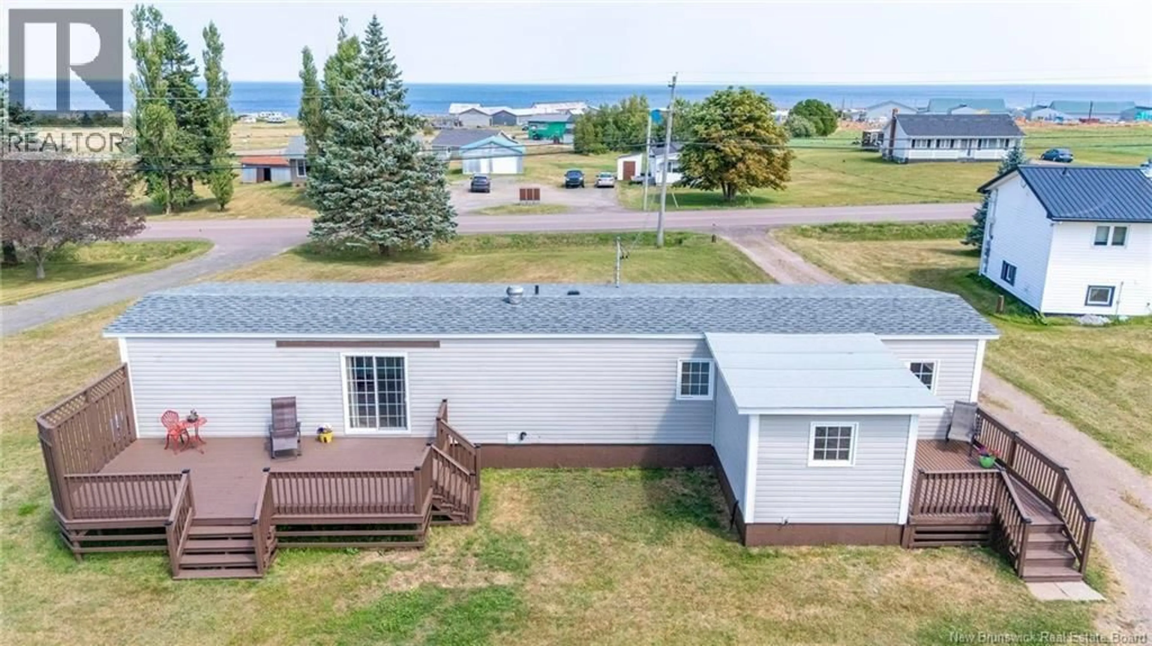 A pic from outside/outdoor area/front of a property/back of a property/a pic from drone, water/lake/river/ocean view for 2021 RTE 950, Petit-Cap New Brunswick E4N2H5