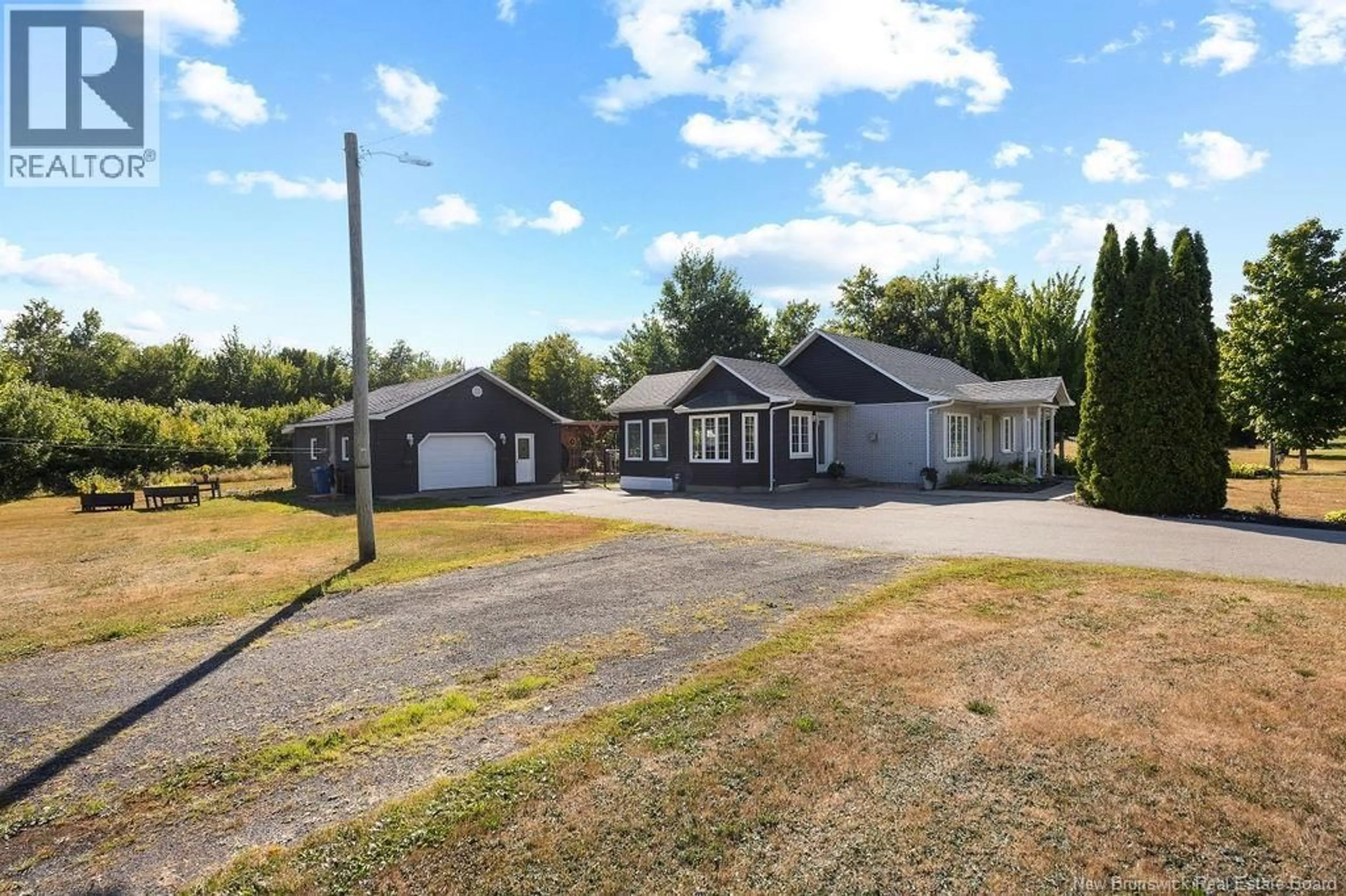 A pic from outside/outdoor area/front of a property/back of a property/a pic from drone, street for 1196 RTE 455, Neguac New Brunswick E9G2Z5