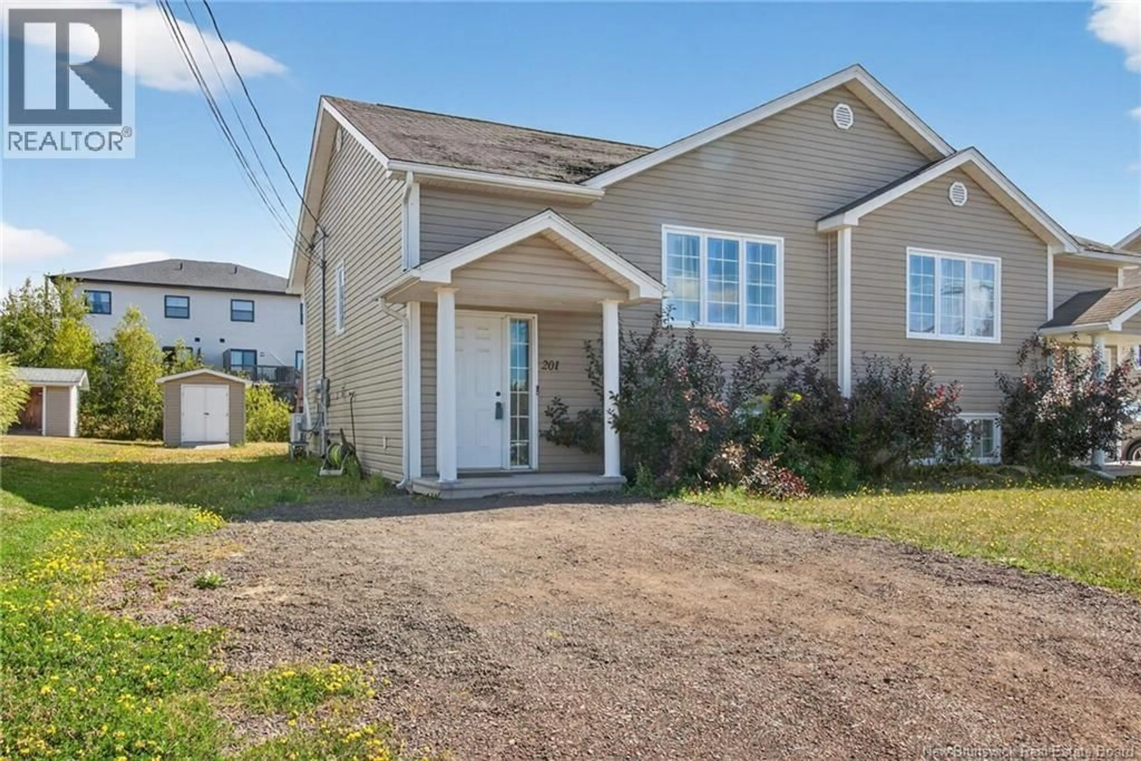 Home with vinyl exterior material, street for 201 PENROSE, Moncton New Brunswick E1E4W7