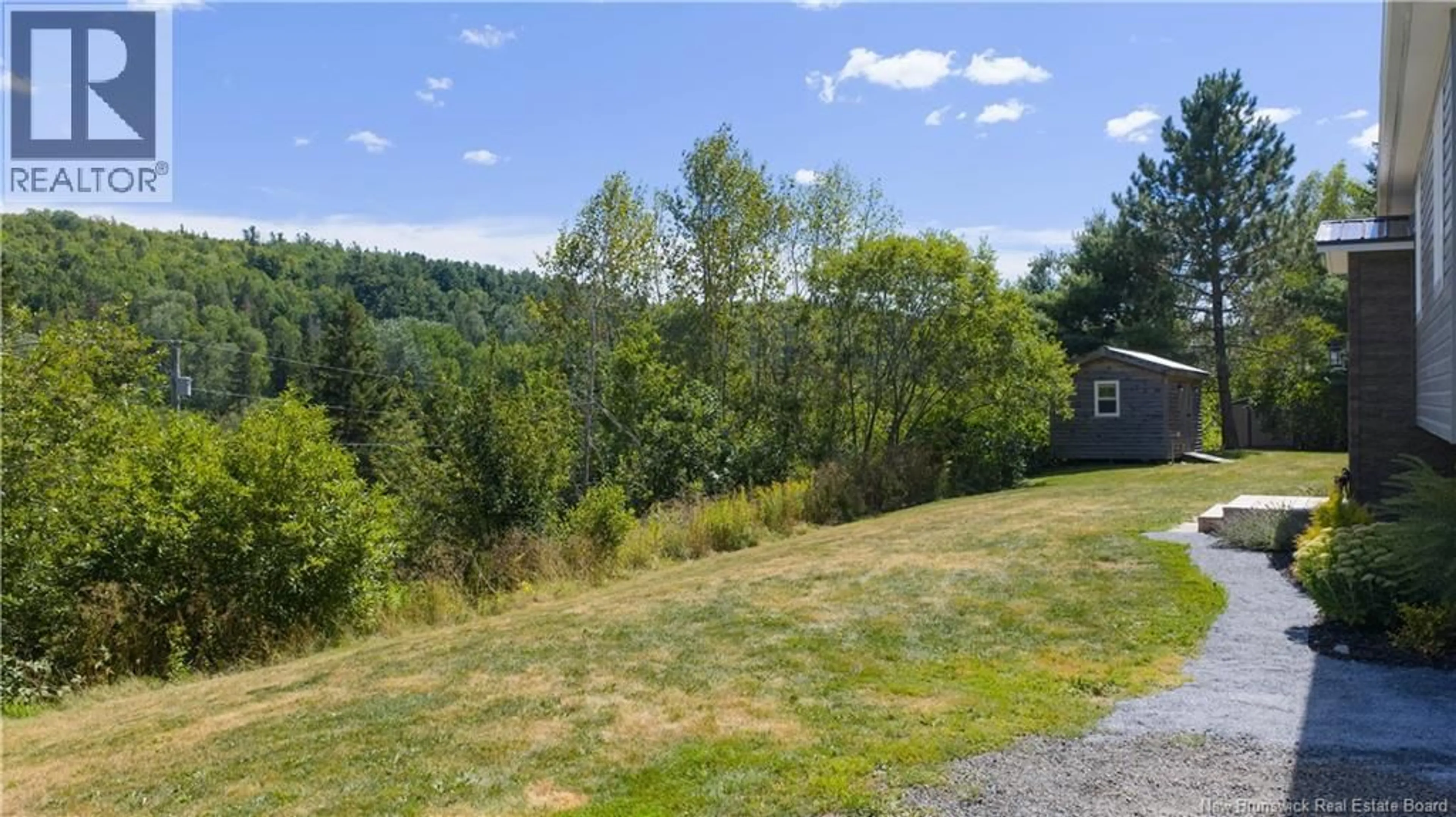 A pic from outside/outdoor area/front of a property/back of a property/a pic from drone, water/lake/river/ocean view for 880 WARDS CREEK ROAD, Sussex New Brunswick E4E4T7