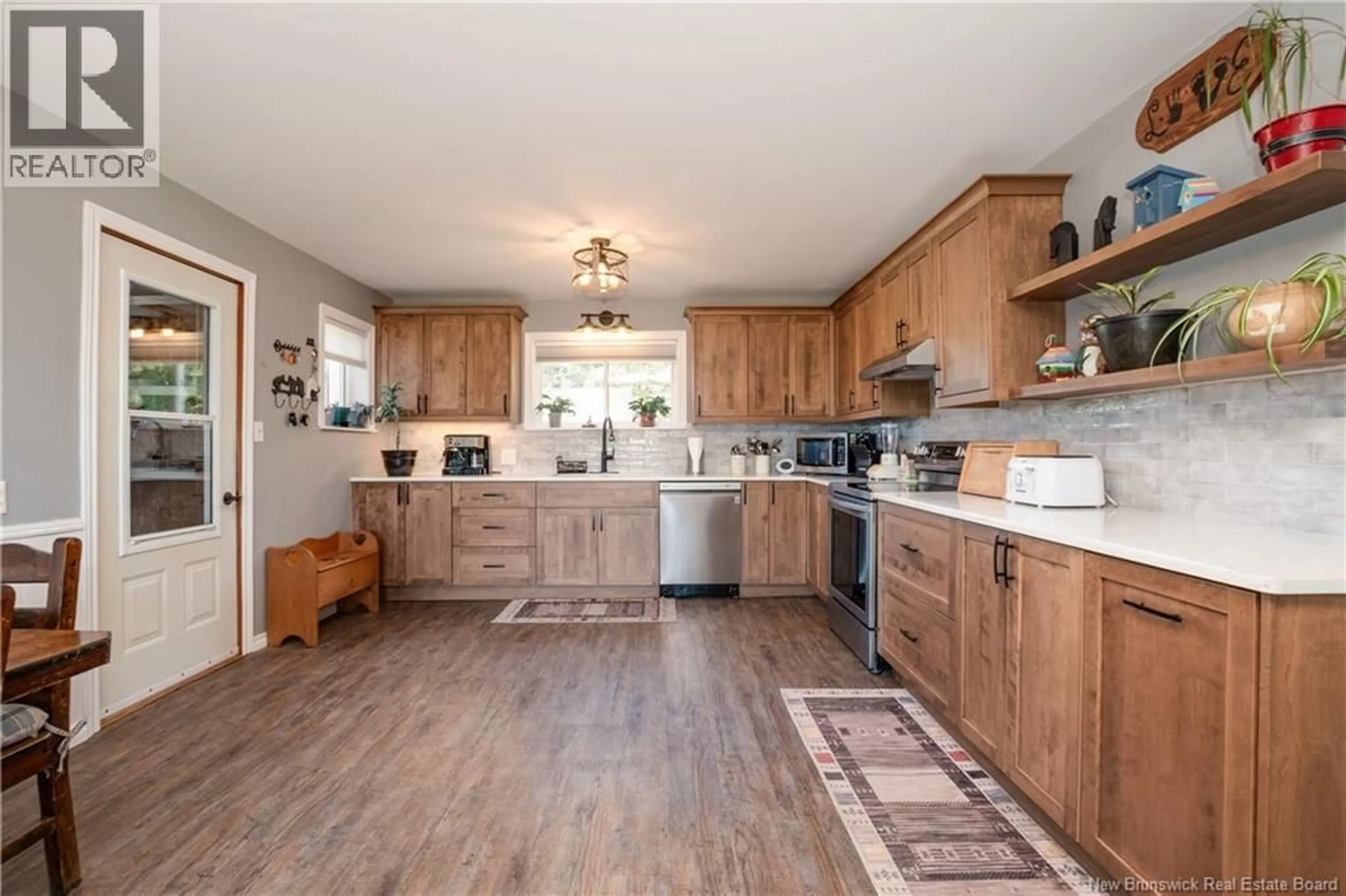 Open concept kitchen, wood/laminate floor for 4 BYRON EAGLES ROAD, Salisbury New Brunswick E4J1S5