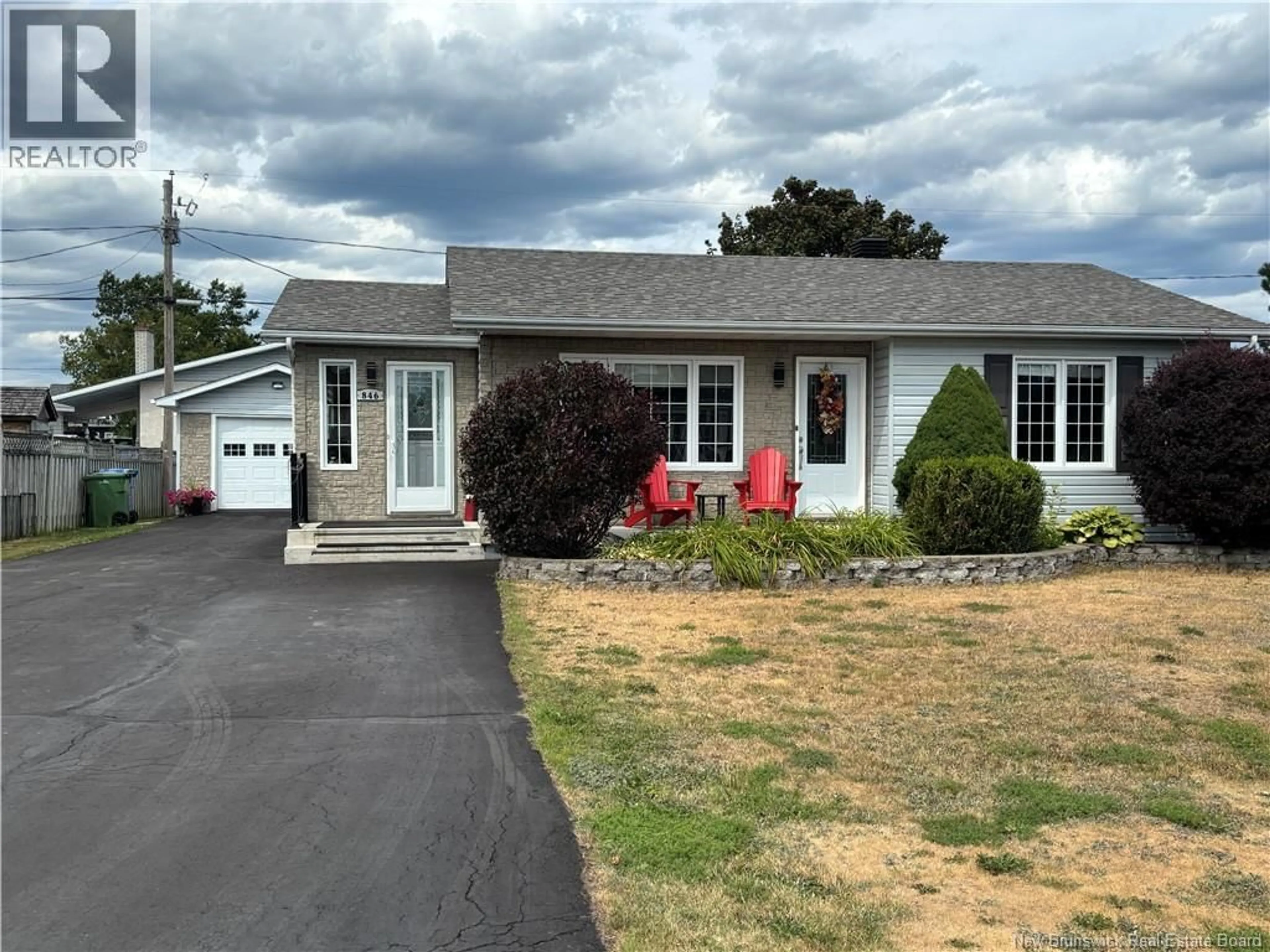 Home with vinyl exterior material, street for 846 RUE ST-PIERRE, Beresford New Brunswick E8K1S2