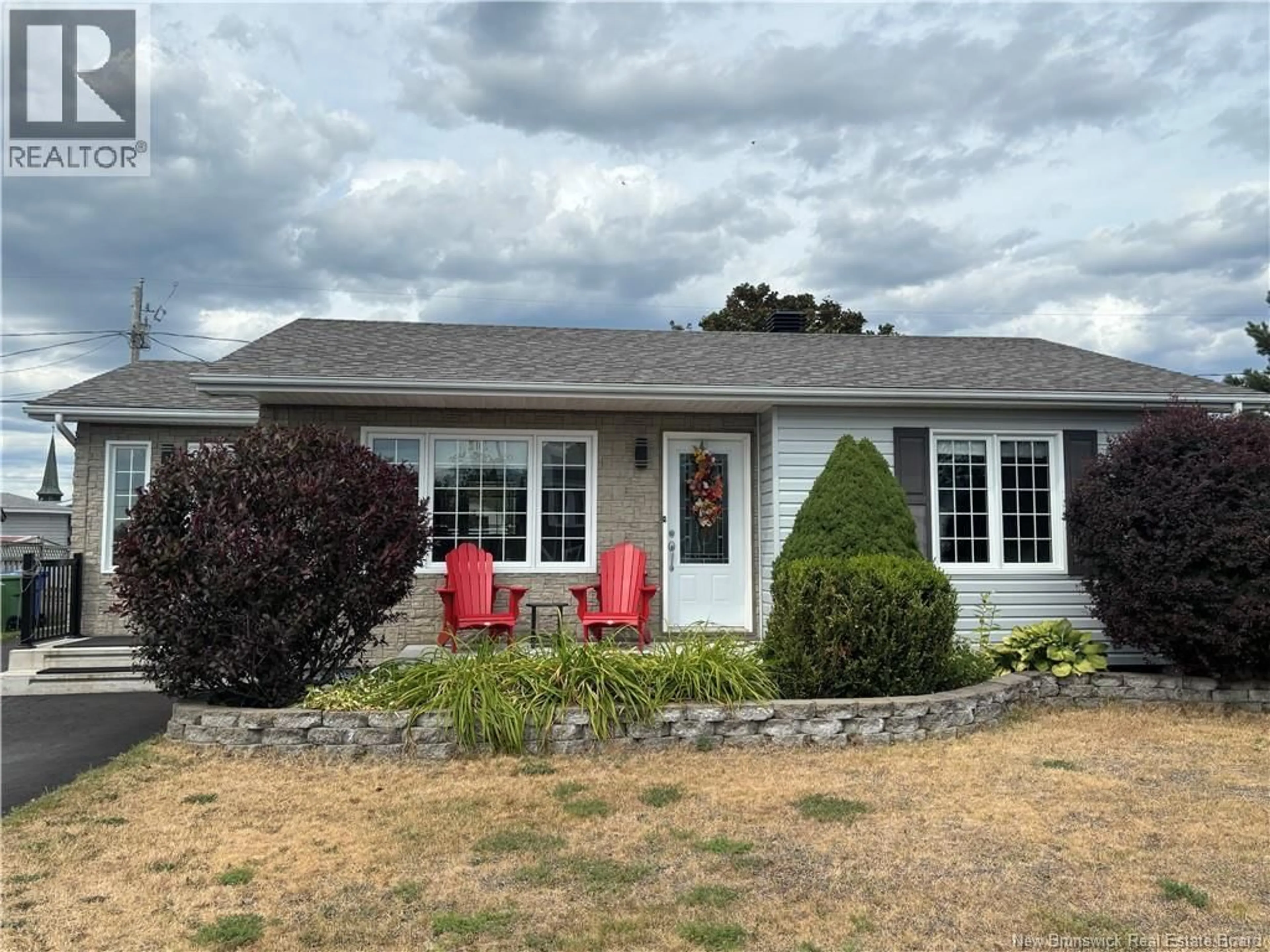 A pic from outside/outdoor area/front of a property/back of a property/a pic from drone, unknown for 846 RUE ST-PIERRE, Beresford New Brunswick E8K1S2