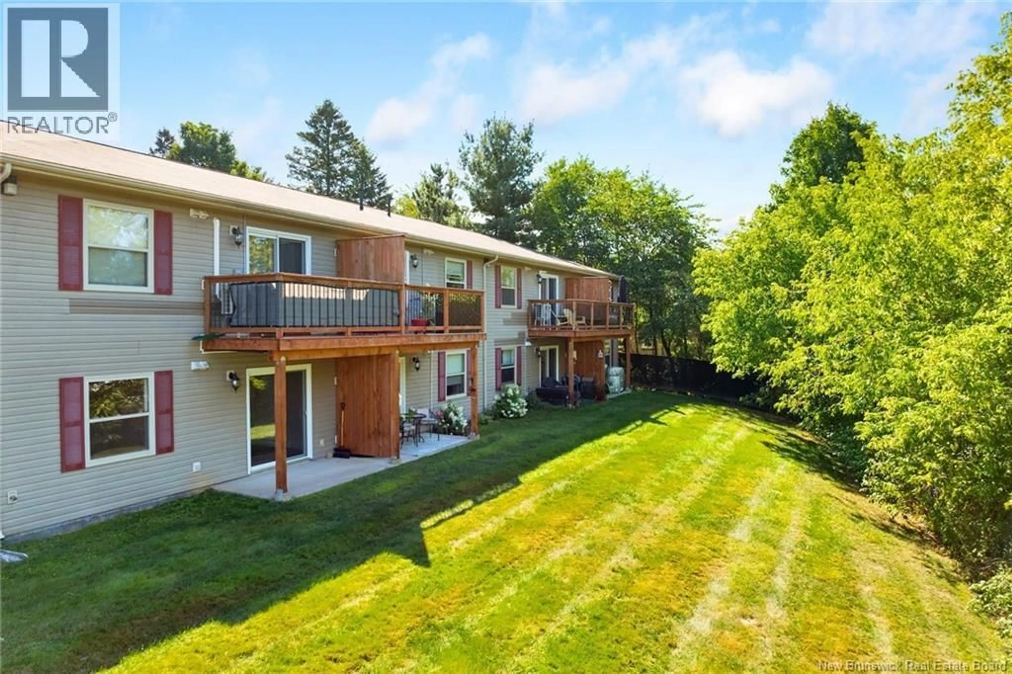 A pic from outside/outdoor area/front of a property/back of a property/a pic from drone, water/lake/river/ocean view for 19 - 40 TRAILSIDE COURT, Fredericton New Brunswick E3A1R7