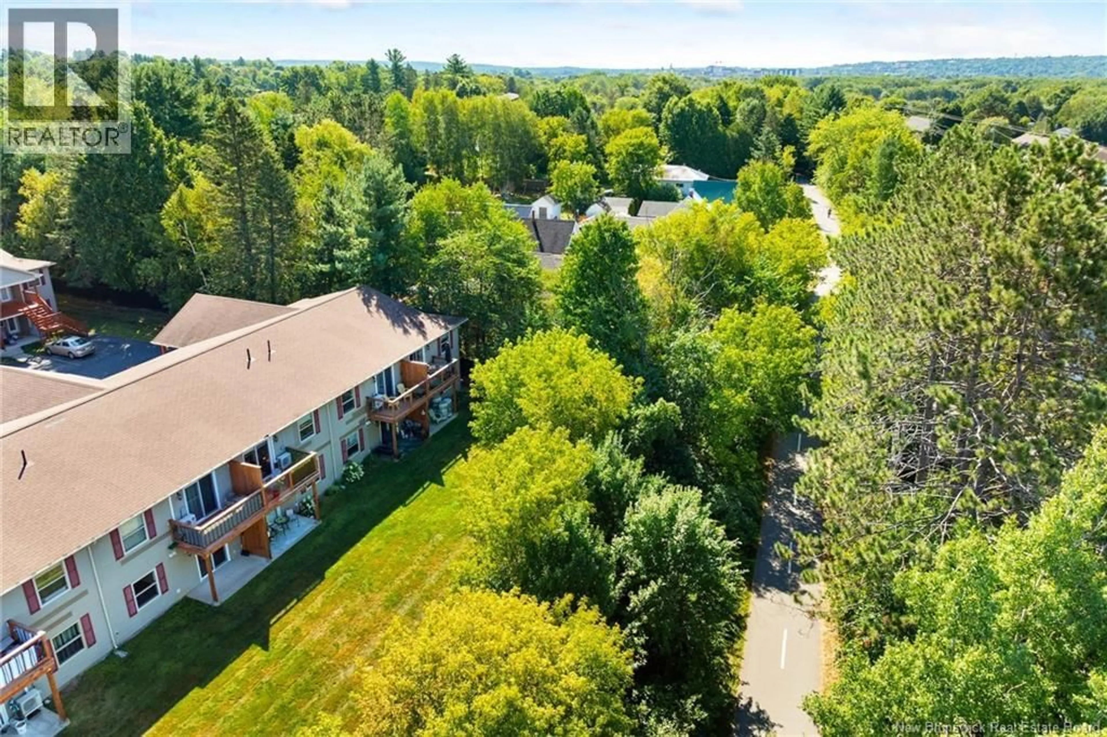 A pic from outside/outdoor area/front of a property/back of a property/a pic from drone, unknown for 19 - 40 TRAILSIDE COURT, Fredericton New Brunswick E3A1R7