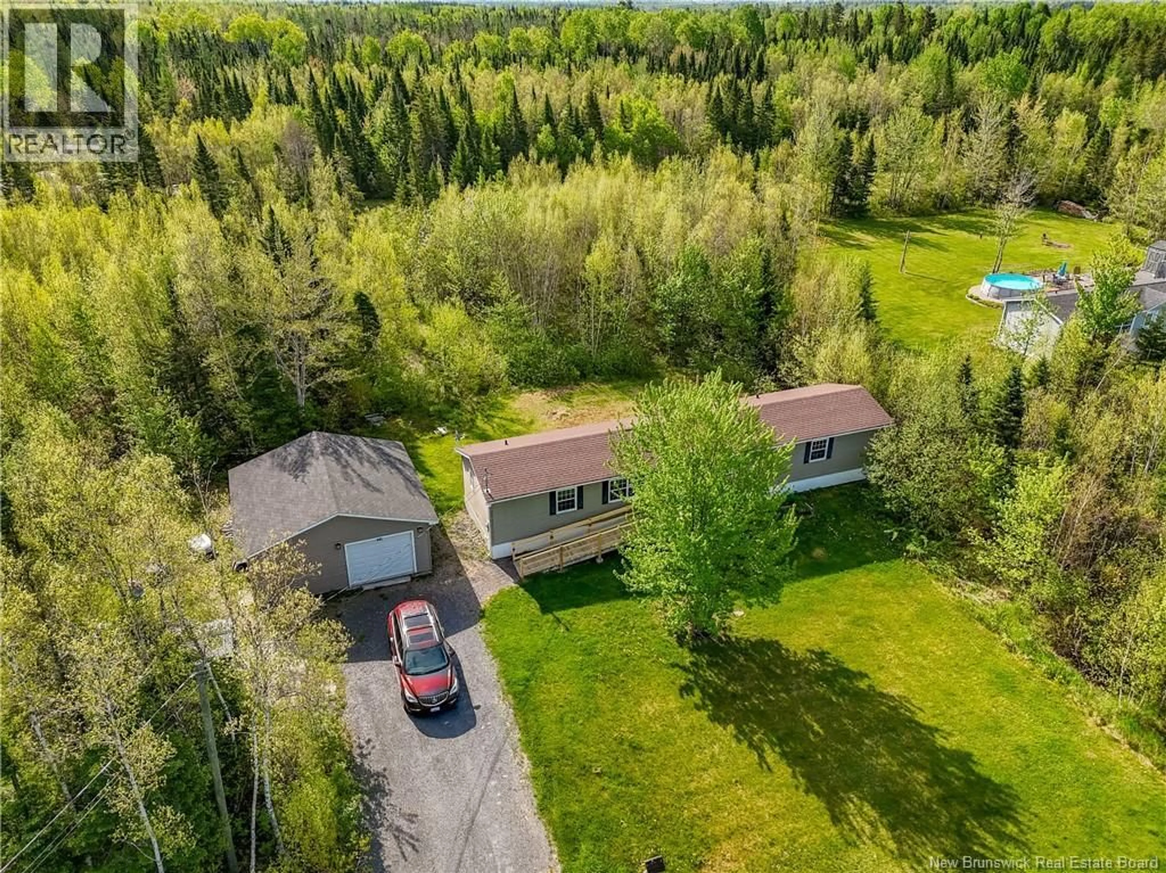 A pic from outside/outdoor area/front of a property/back of a property/a pic from drone, forest/trees view for 34 LAWLER DRIVE, Rusagonis New Brunswick E3B0N5