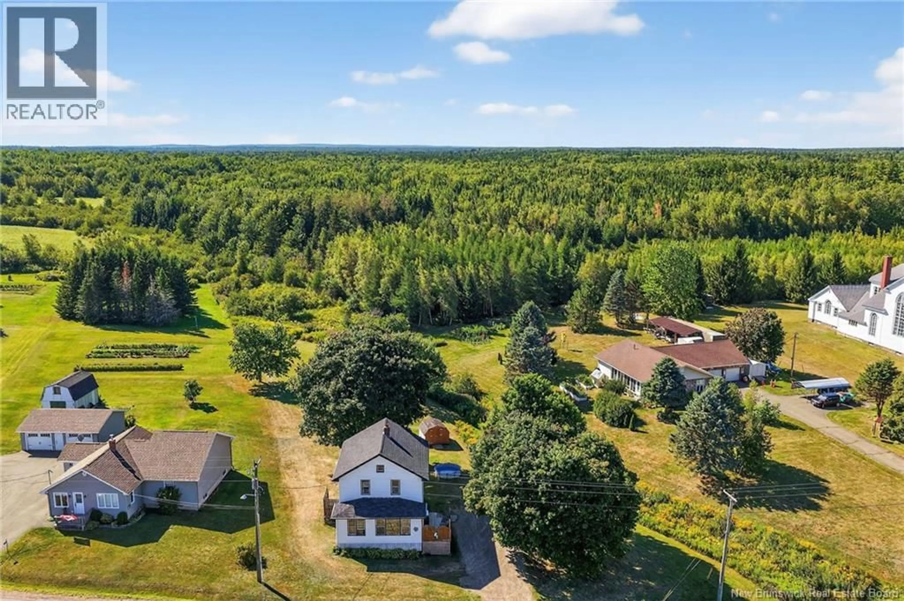 A pic from outside/outdoor area/front of a property/back of a property/a pic from drone, forest/trees view for 3081 ROUTE 132, Scoudouc New Brunswick E4P3R7