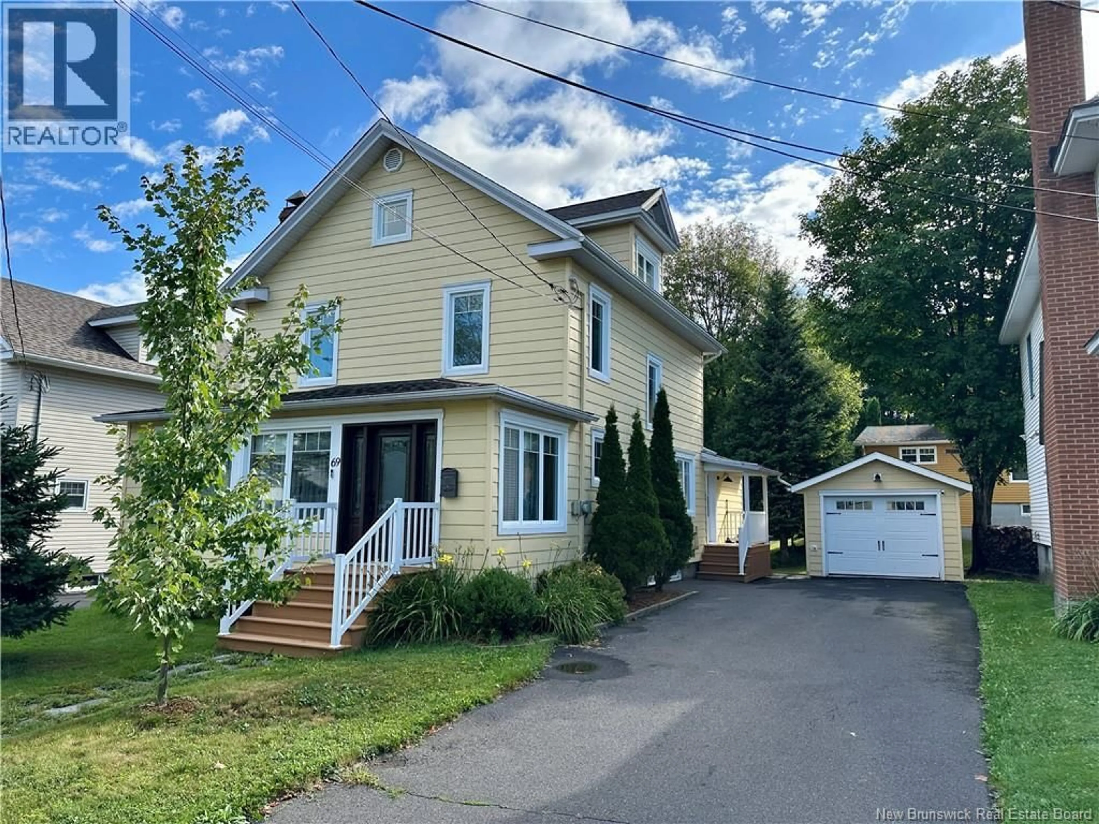 Home with vinyl exterior material, street for 69 FRASER AVENUE, Edmundston New Brunswick E3V2B6