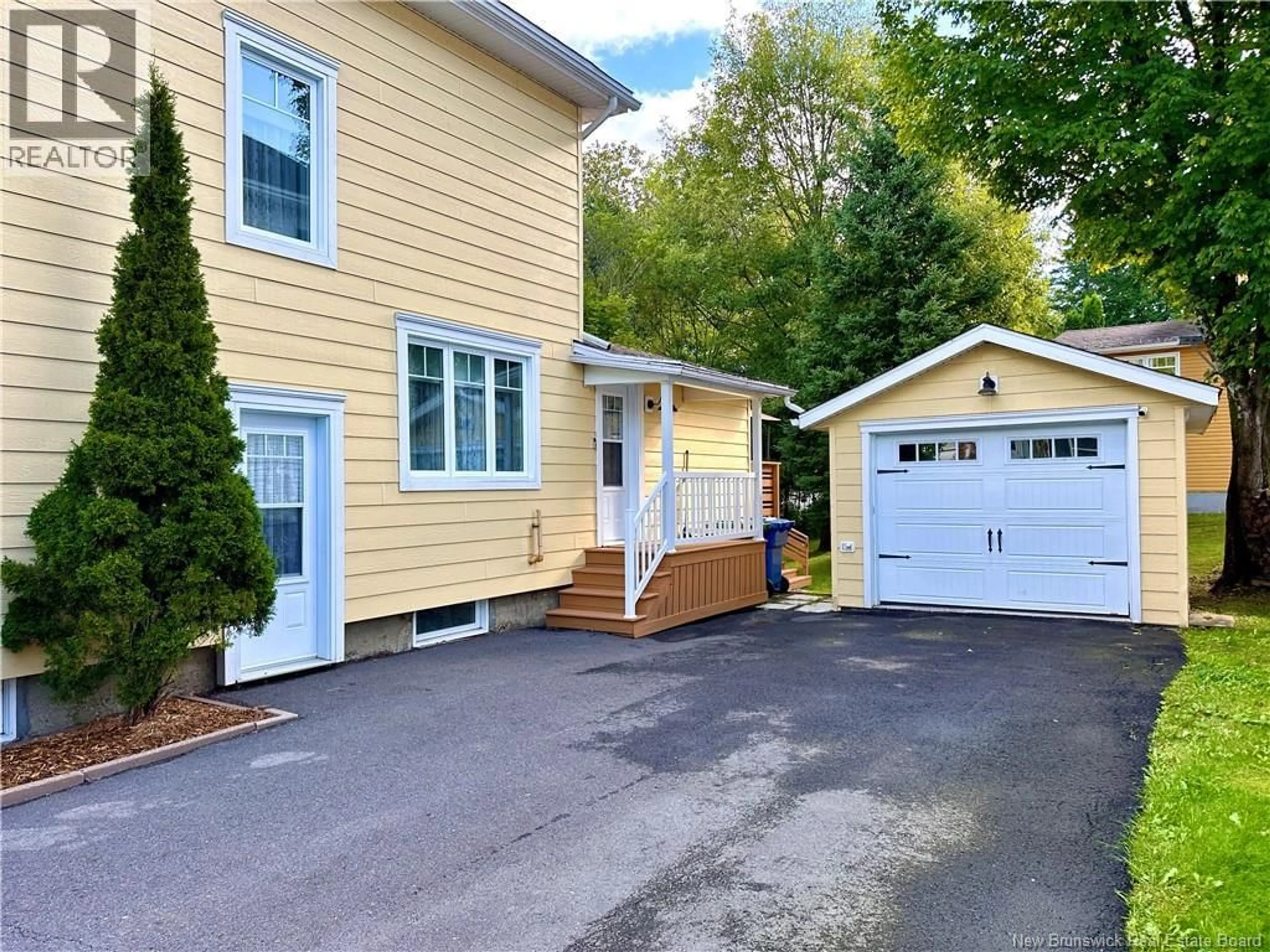 Home with vinyl exterior material, street for 69 FRASER AVENUE, Edmundston New Brunswick E3V2B6