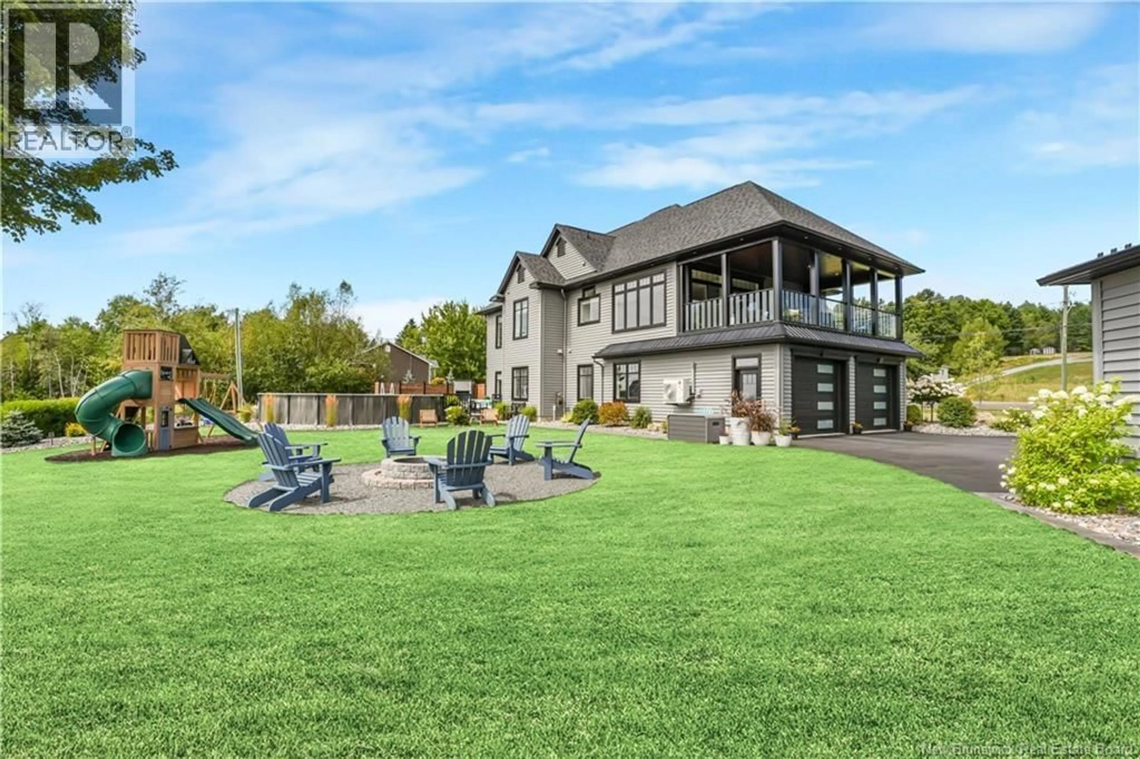 A pic from outside/outdoor area/front of a property/back of a property/a pic from drone, water/lake/river/ocean view for 207 CARLISLE ROAD, Douglas New Brunswick E3G7M9