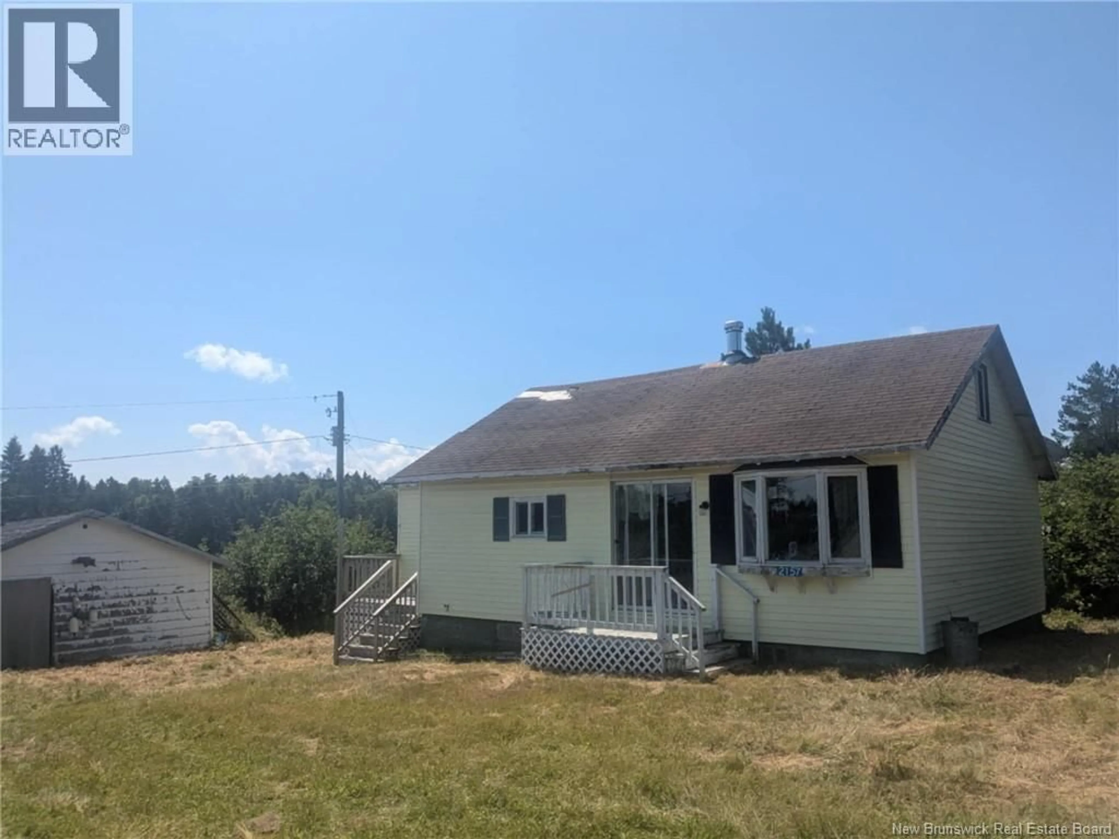 Home with vinyl exterior material, mountain view for 2157 ROUTE 774, Wilsons Beach New Brunswick E5E1J8