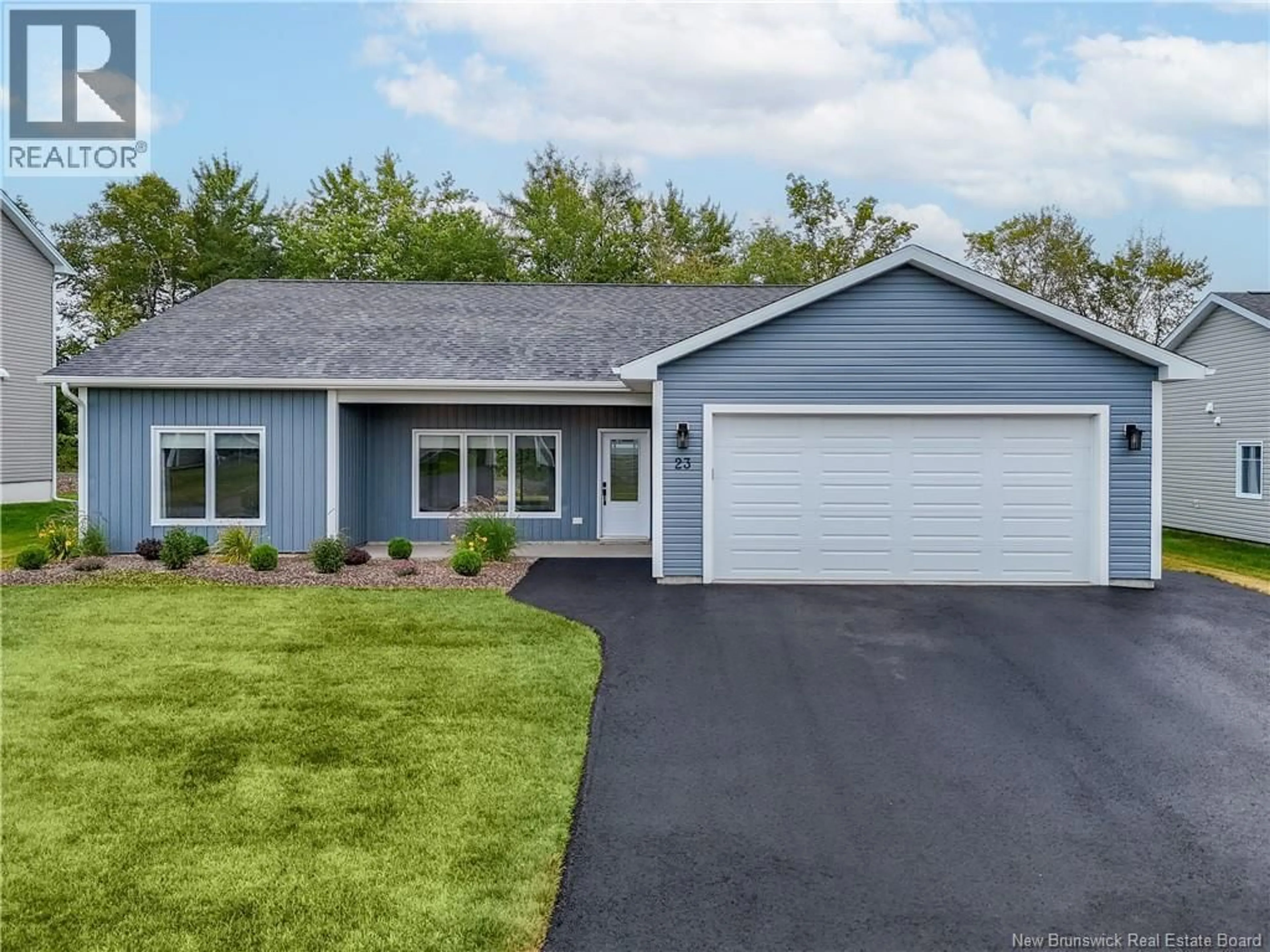 Home with vinyl exterior material, street for 23 BOXWOOD LANE, New Maryland New Brunswick E3C0R7
