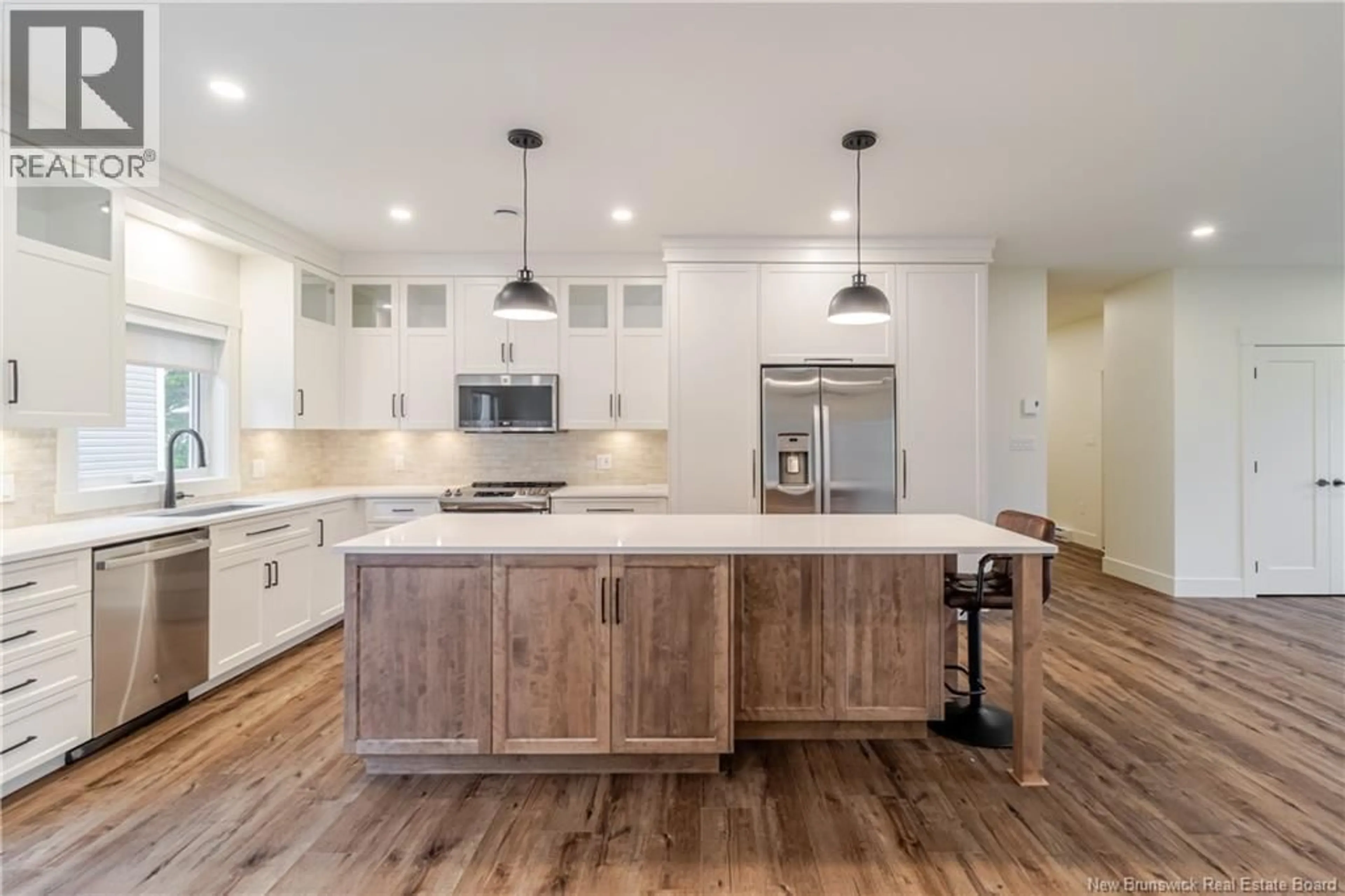 Open concept kitchen, wood/laminate floor for 23 BOXWOOD LANE, New Maryland New Brunswick E3C0R7