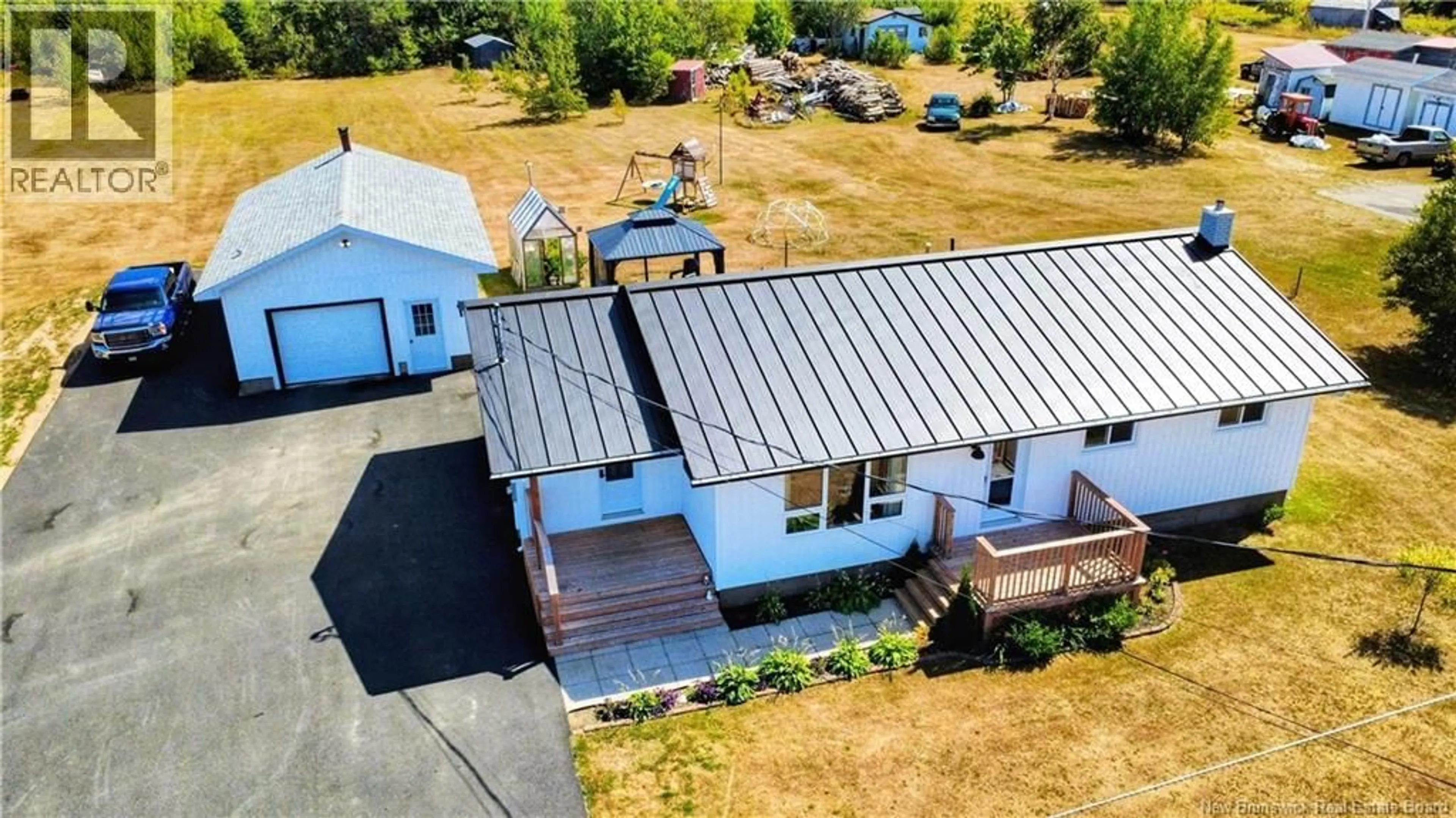 A pic from outside/outdoor area/front of a property/back of a property/a pic from drone, building for 21 CHEM. POKESUDIE, Pokesudie New Brunswick E1W5T6
