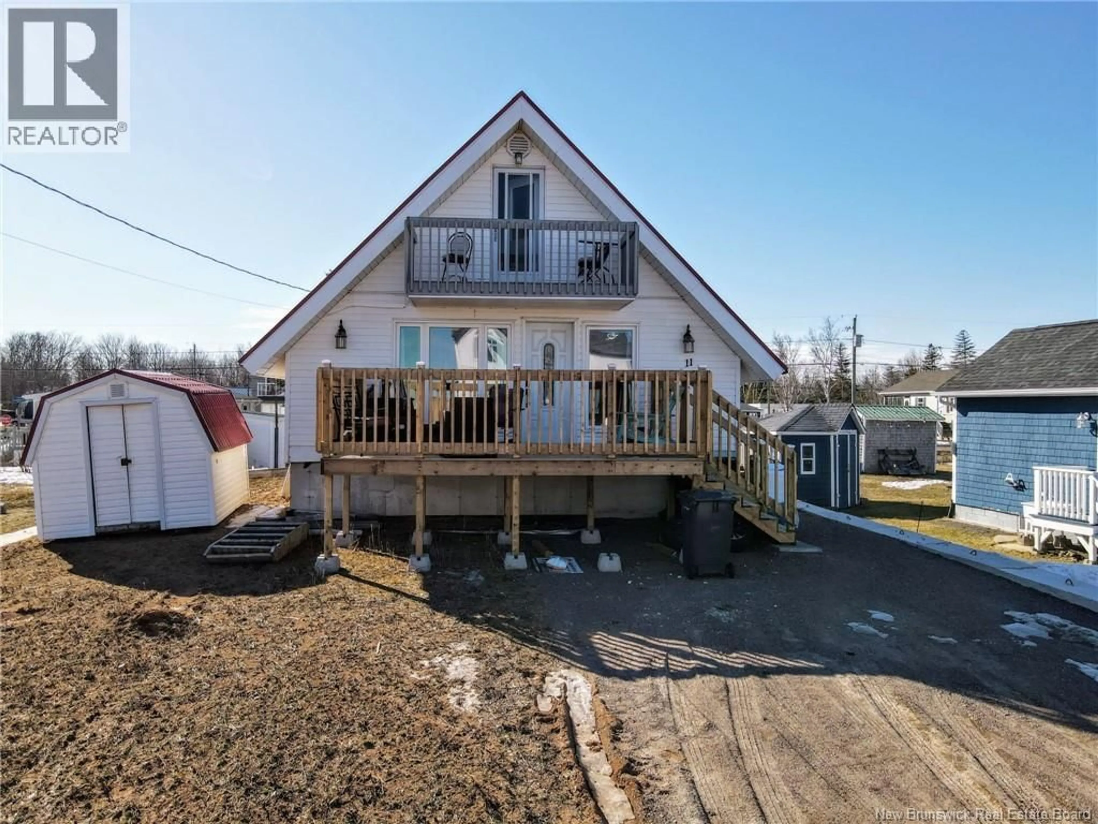 Home with vinyl exterior material, street for 11 SUR L' OCEAN STREET, Grand-Barachois New Brunswick E4P8N9