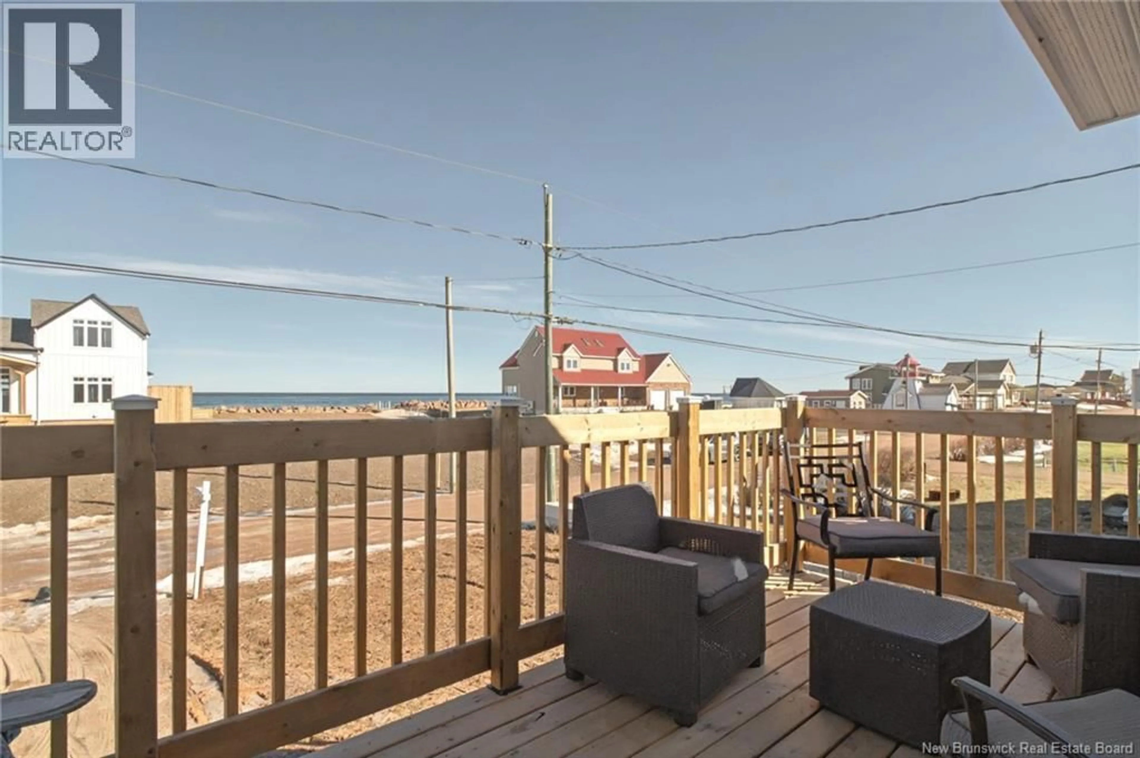 Patio, water/lake/river/ocean view for 11 SUR L' OCEAN STREET, Grand-Barachois New Brunswick E4P8N9