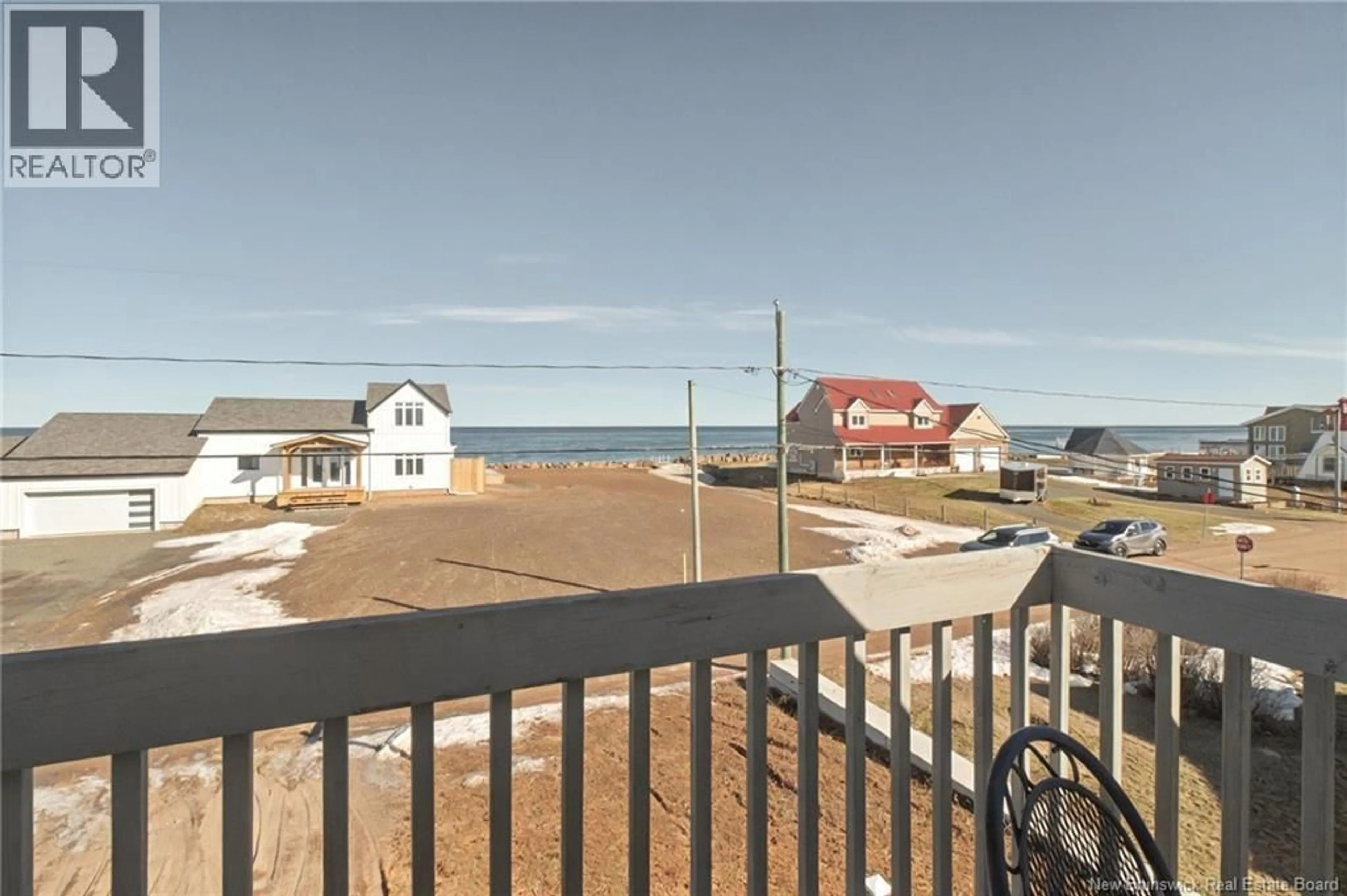 A pic from outside/outdoor area/front of a property/back of a property/a pic from drone, water/lake/river/ocean view for 11 SUR L' OCEAN STREET, Grand-Barachois New Brunswick E4P8N9
