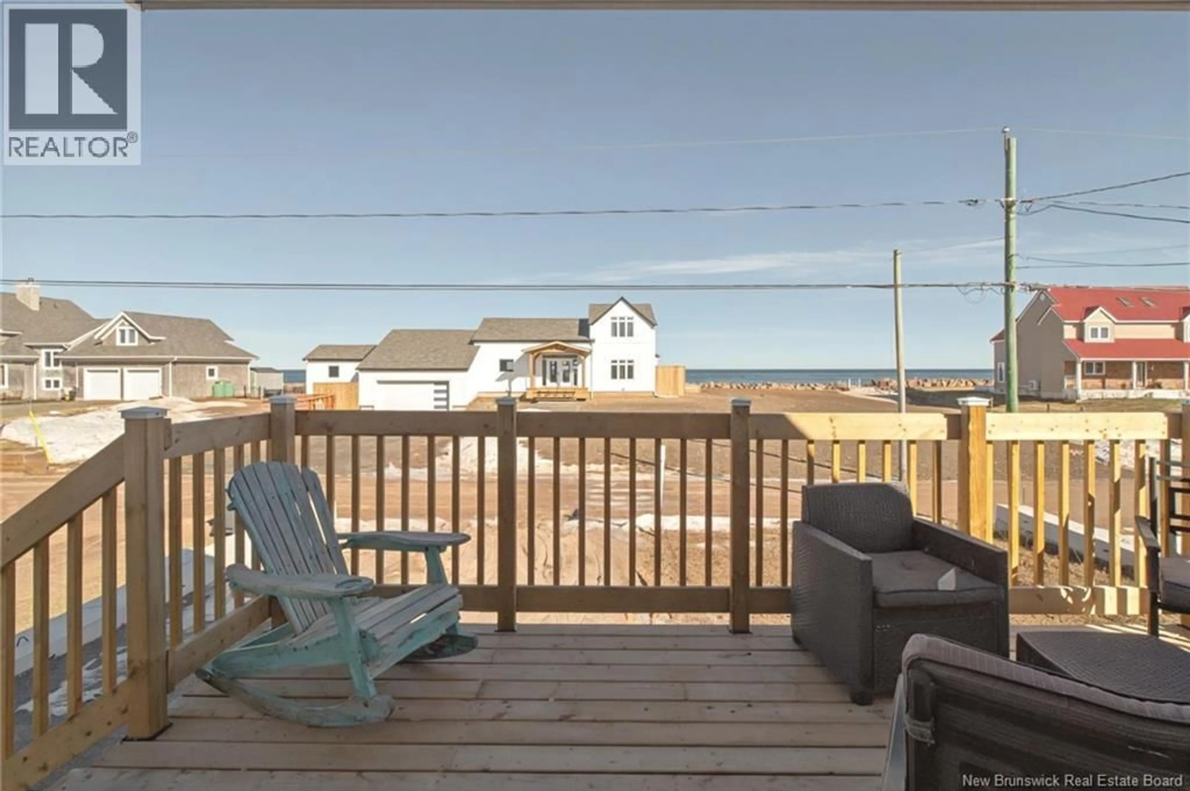 Patio, water/lake/river/ocean view for 11 SUR L' OCEAN STREET, Grand-Barachois New Brunswick E4P8N9