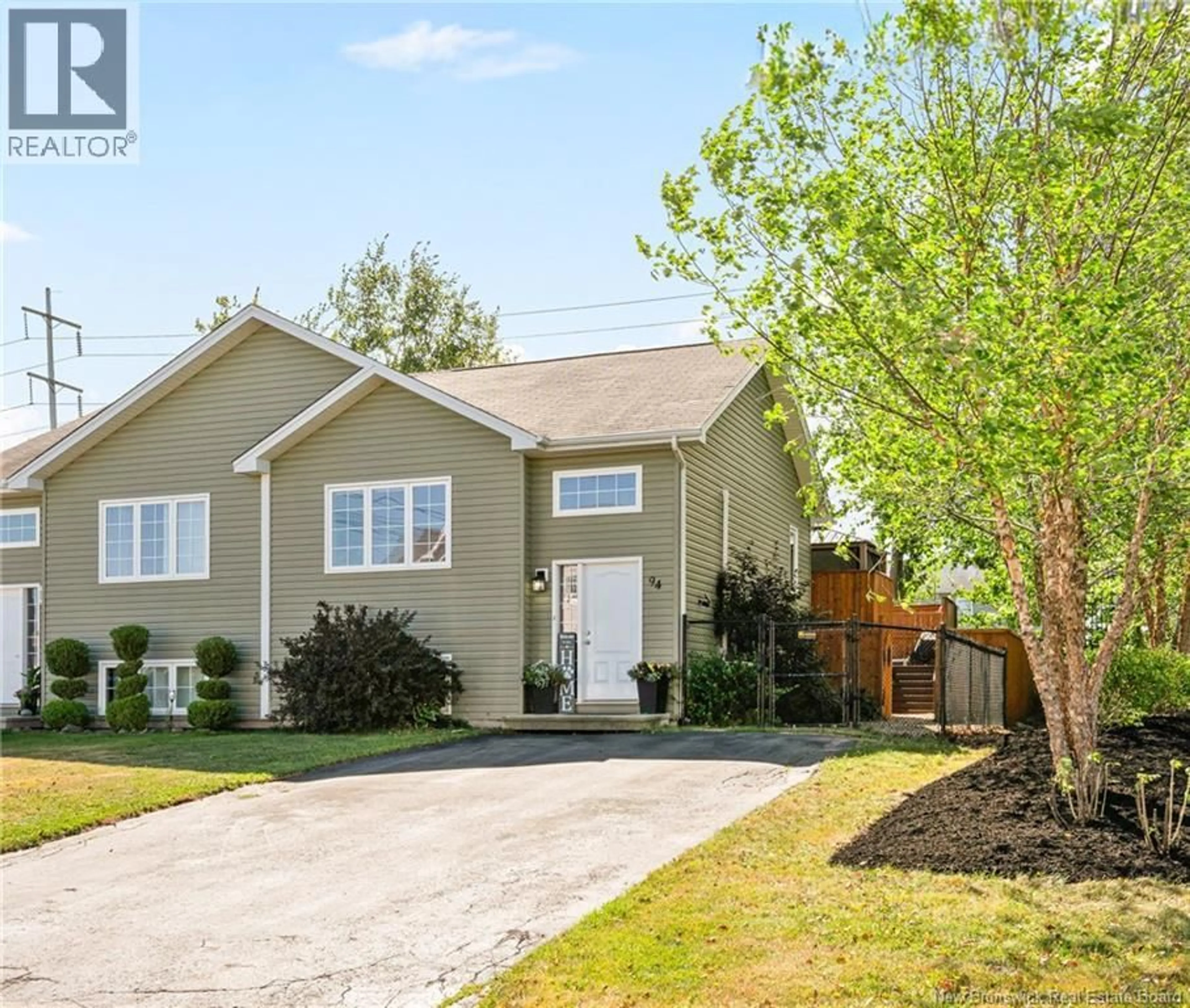 Home with vinyl exterior material, street for 94 HOLLAND DRIVE, Moncton New Brunswick E1G0X1