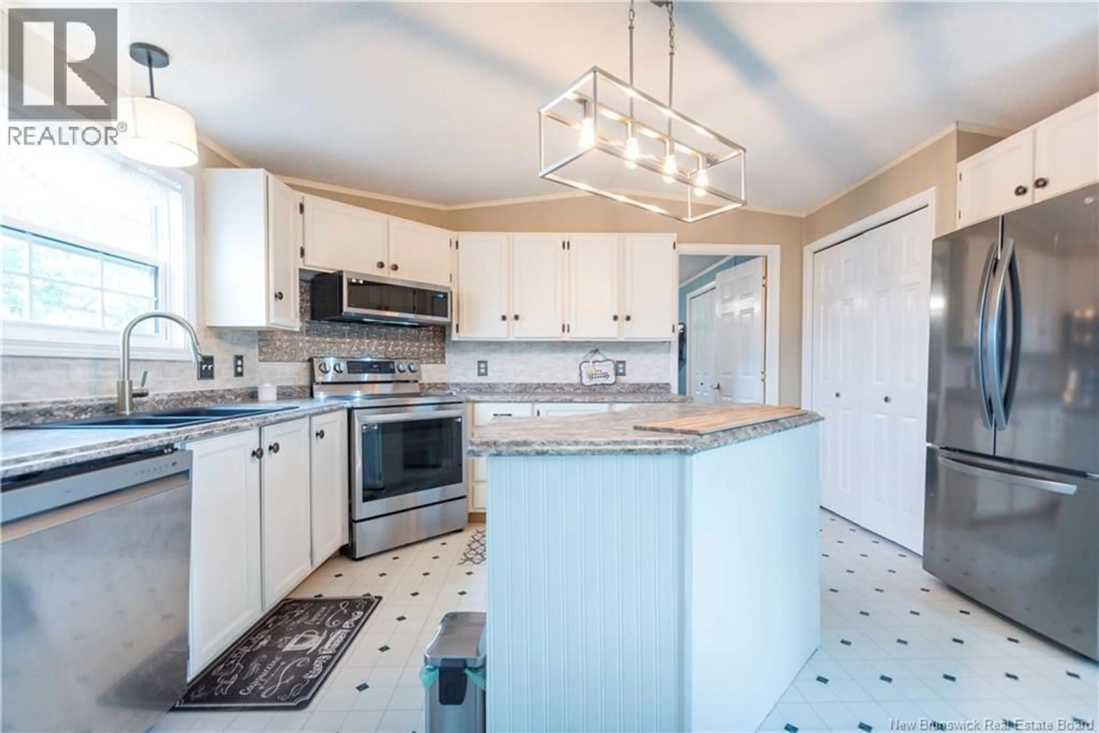 Open concept kitchen, ceramic/tile floor for 6 SCOTCH PINE STREET, Moncton New Brunswick E1H3C5