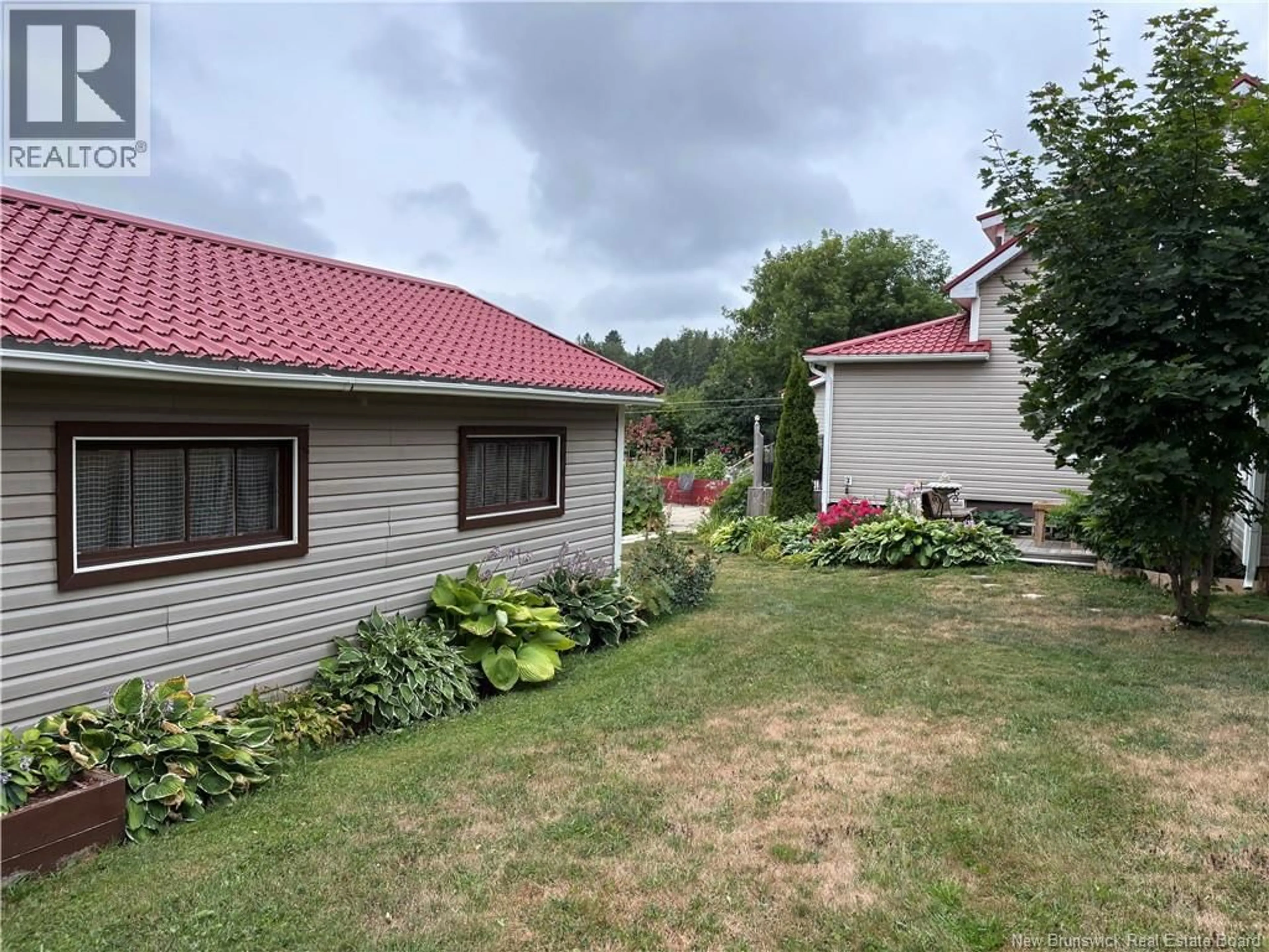 A pic from outside/outdoor area/front of a property/back of a property/a pic from drone, unknown for 1760 ST.PETER AVENUE, Bathurst New Brunswick E2A7J4