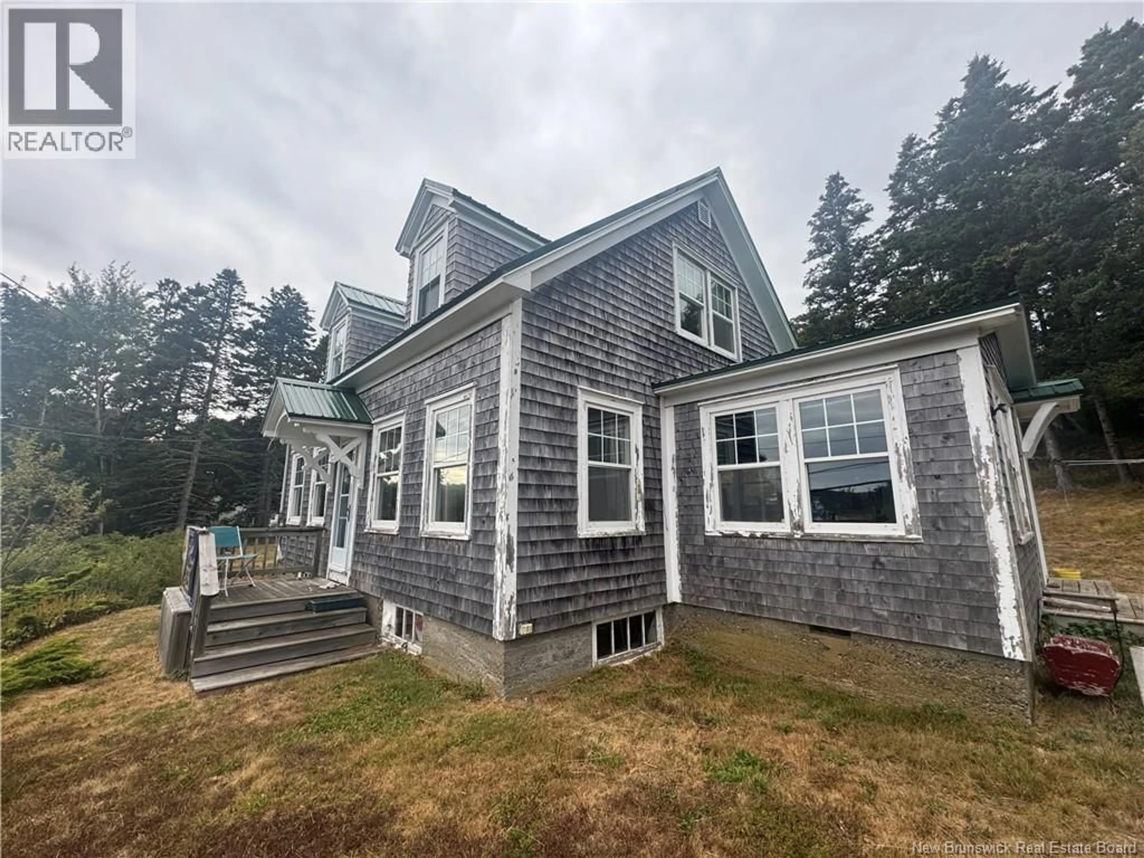 Home with vinyl exterior material, building for 106 ROUTE 776, Grand Manan New Brunswick E5G1A1