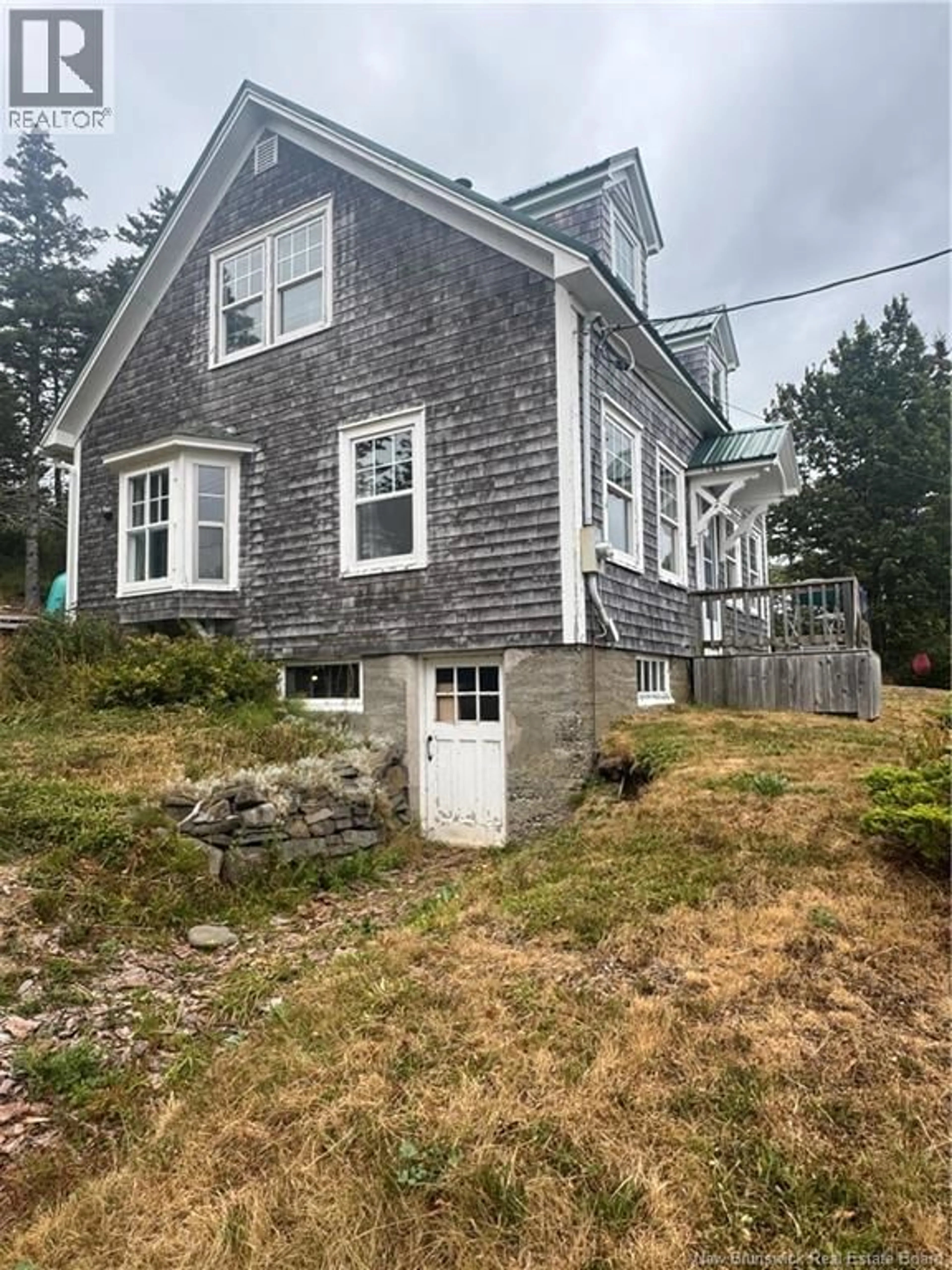 A pic from outside/outdoor area/front of a property/back of a property/a pic from drone, building for 106 ROUTE 776, Grand Manan New Brunswick E5G1A1