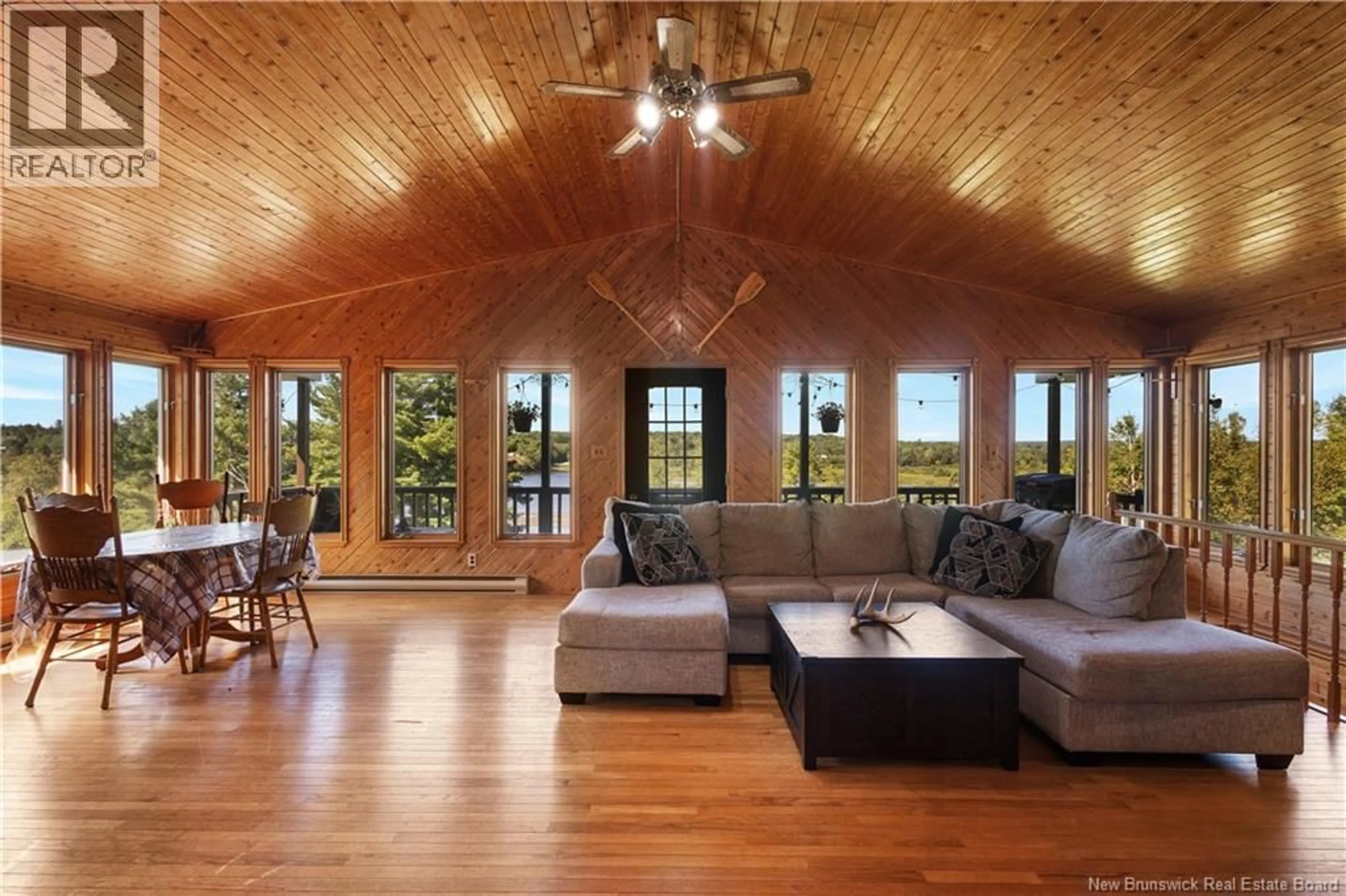 Living room with furniture, wood/laminate floor for 19 TOZER LANE, Sunny Corner New Brunswick E9E1S7